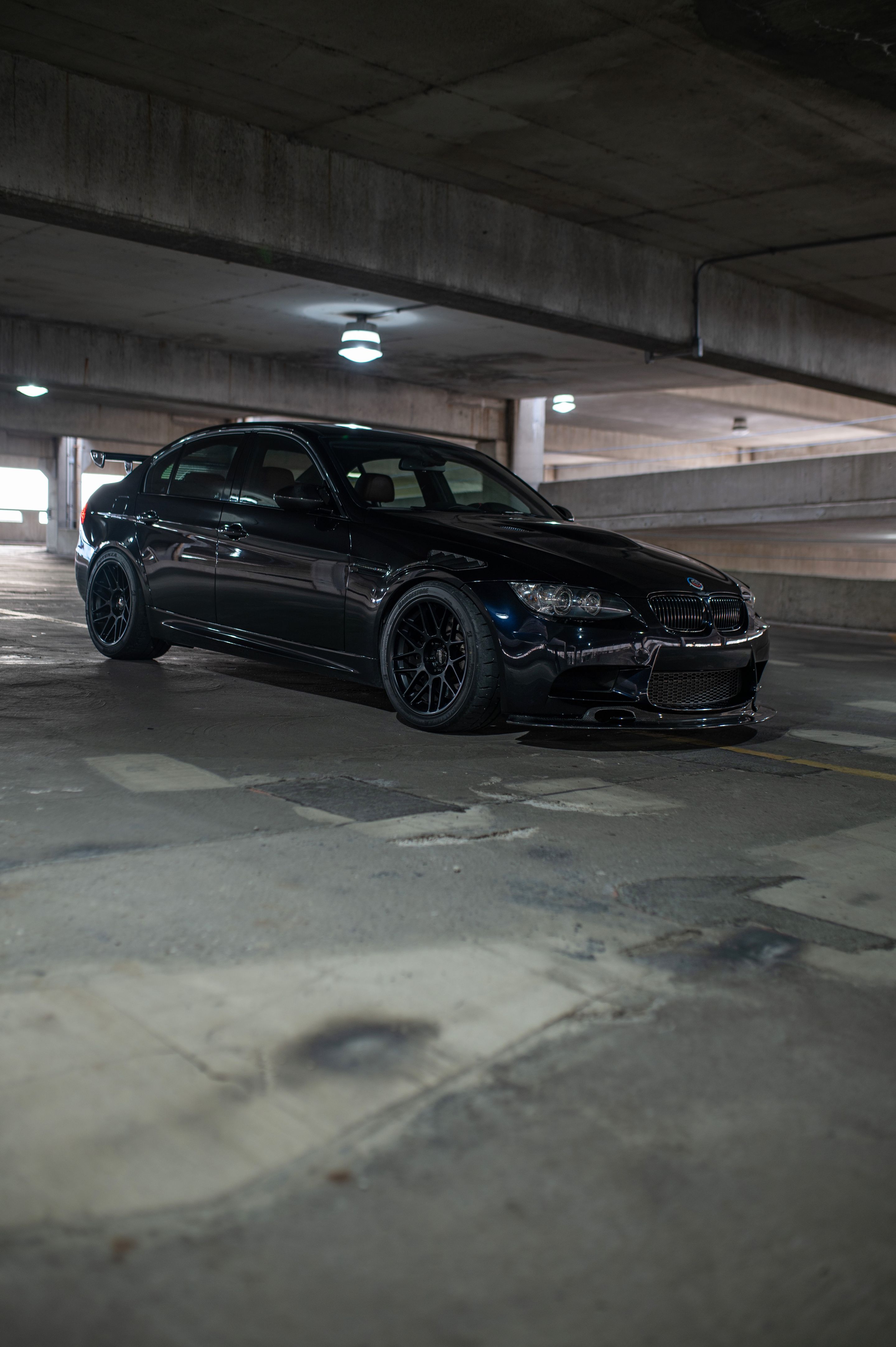 Black BMW E90 Sedan M3 with 18" ARC-8 Apex wheels in Satin Black