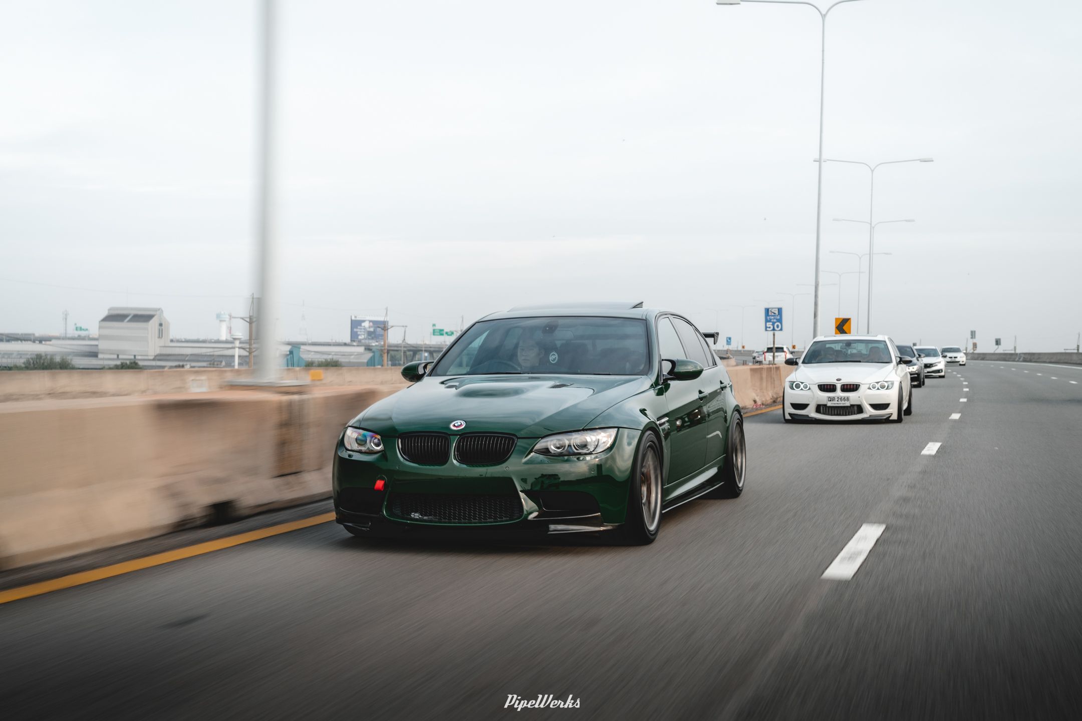 Green BMW E90 Sedan 3 Series with 18" ARC-8 Apex wheels in Anthracite