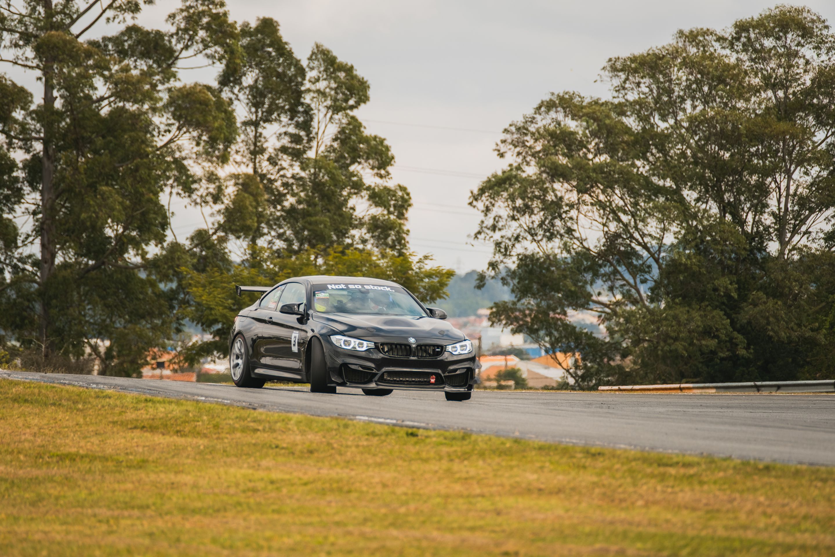 Black BMW F82 Coupe M4 with 18" EC-7 Apex wheels in Race Silver
