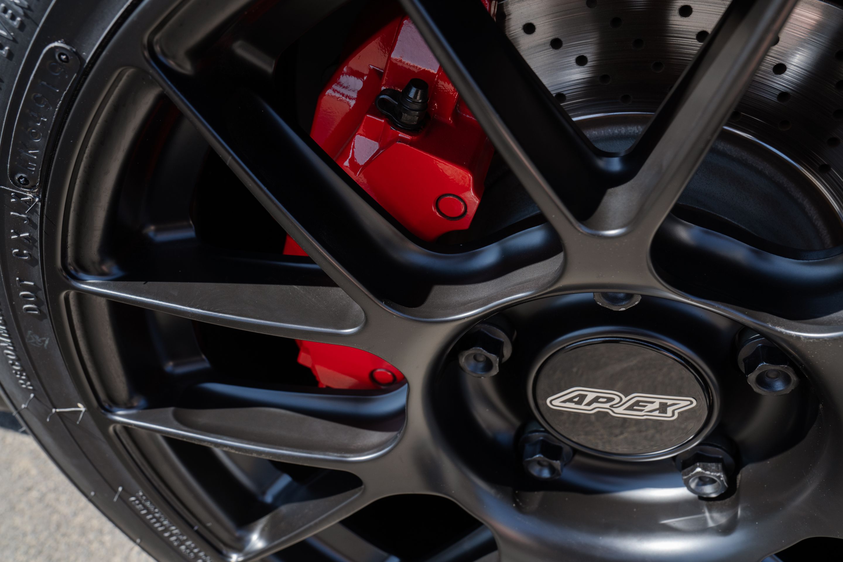 Black Porsche 911 997 Carrera 4S with 18" EC-7RS Apex wheels in Satin Black