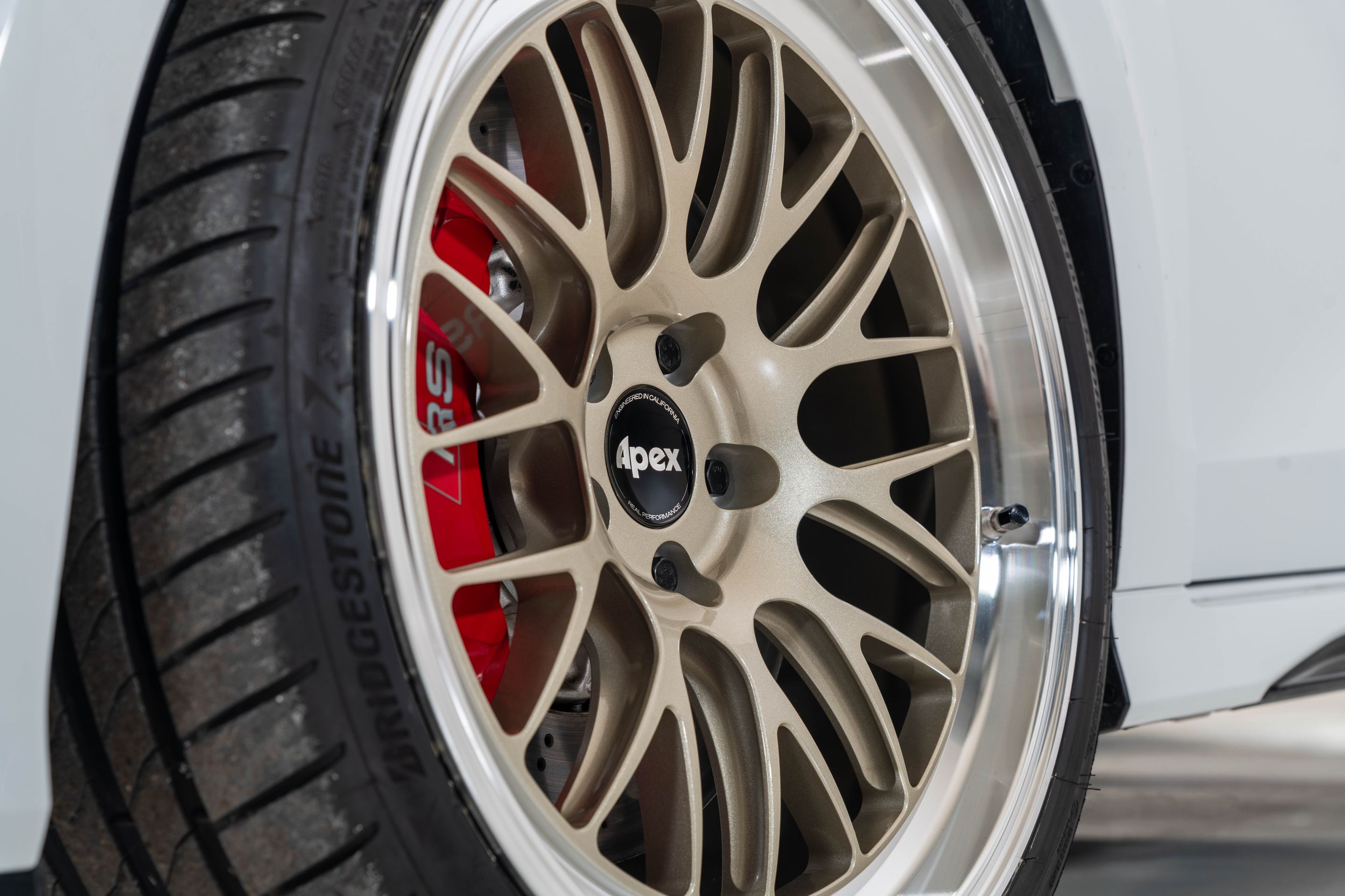 Race Livery Audi 8Y RS 3 with 19" ML-10RT Apex wheels in Machined Lip Gloss Motorsport Gold