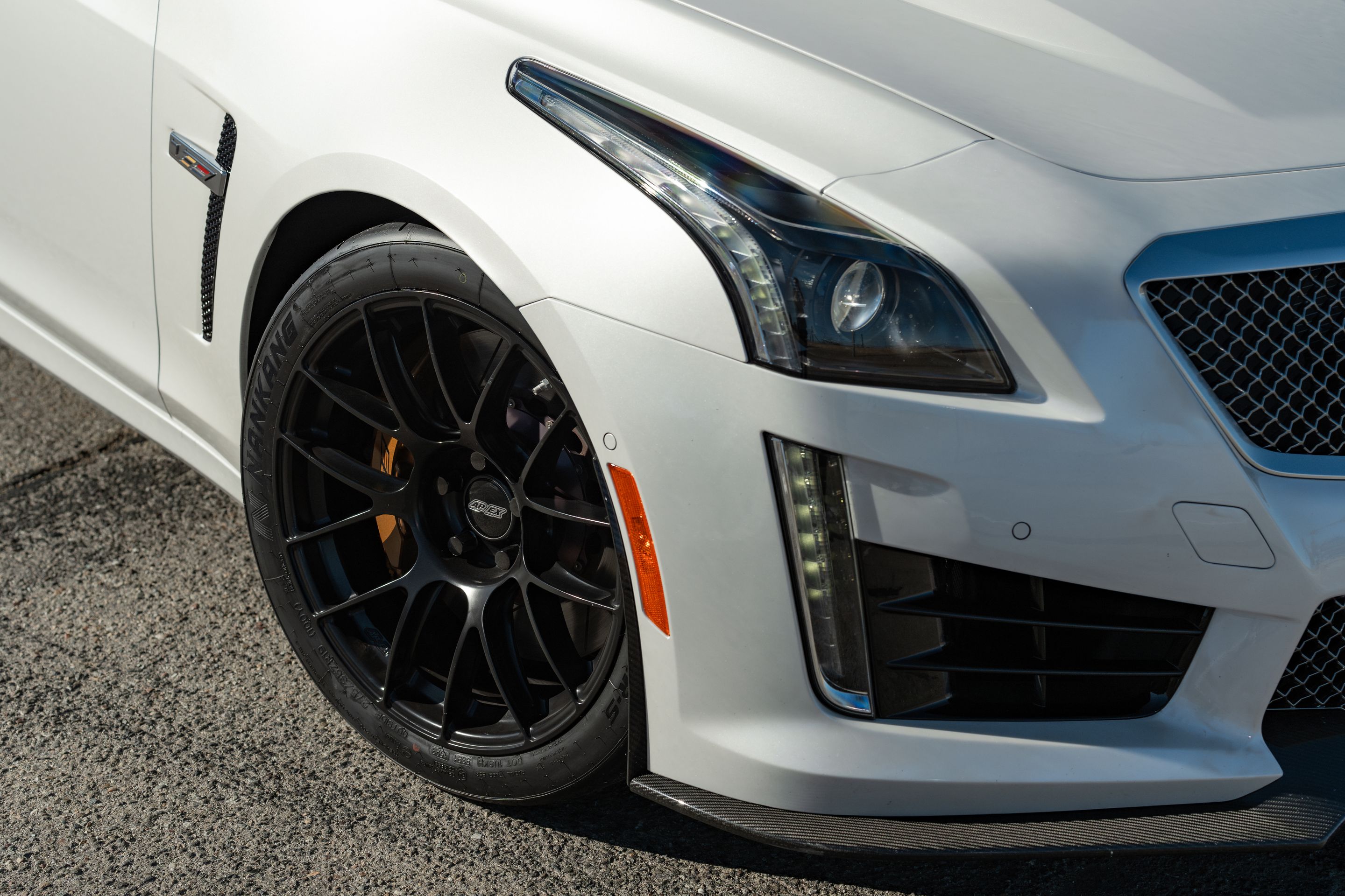 White Cadillac Gen 3 CTS-V with 19" EC-7RS Apex wheels in Satin Black