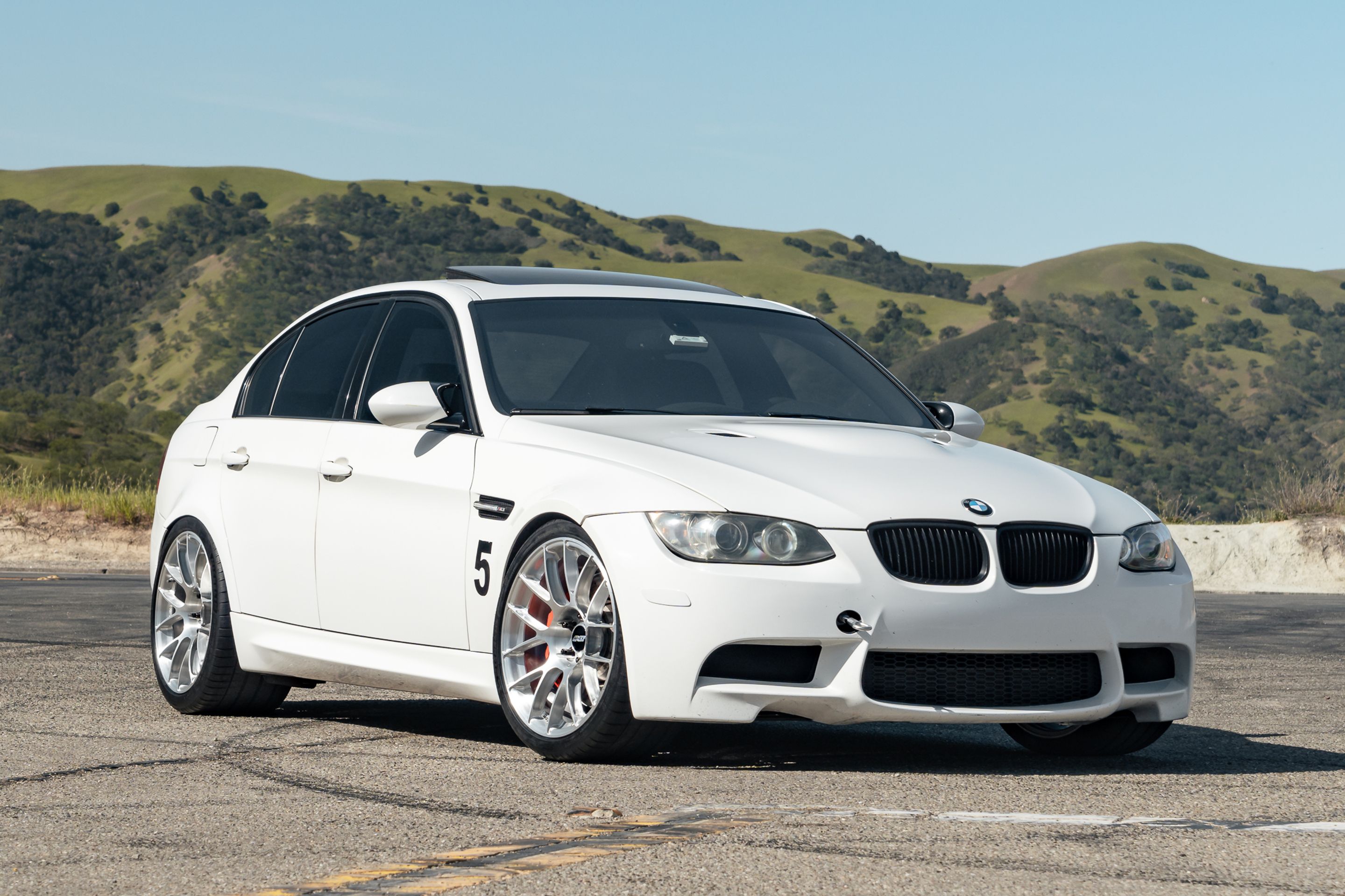 White BMW E90 Sedan M3 with 19" EC-7RS Apex wheels in Brushed Clear