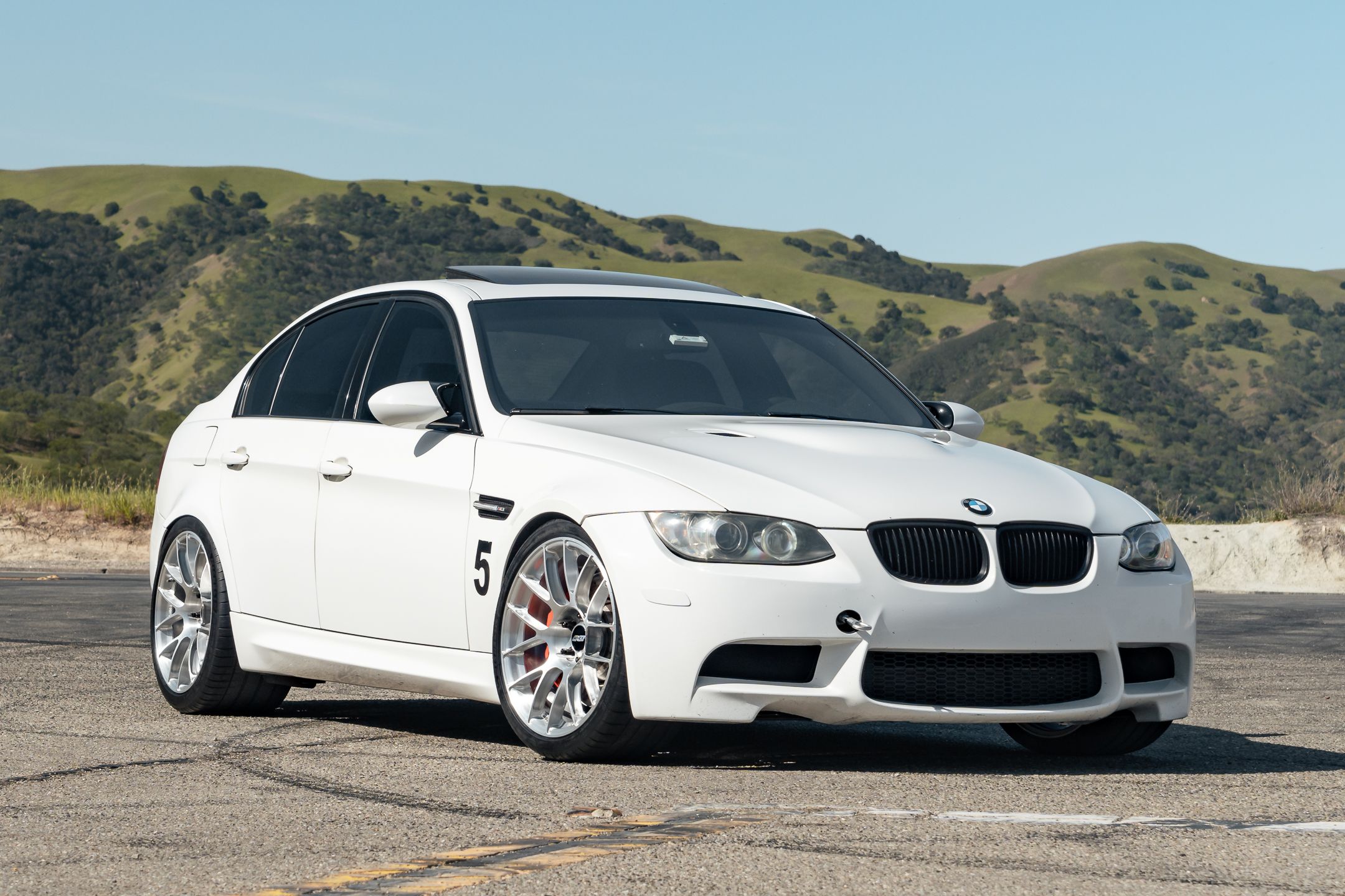 White BMW E90 Sedan M3 with 19" EC-7RS Apex wheels in Brushed Clear