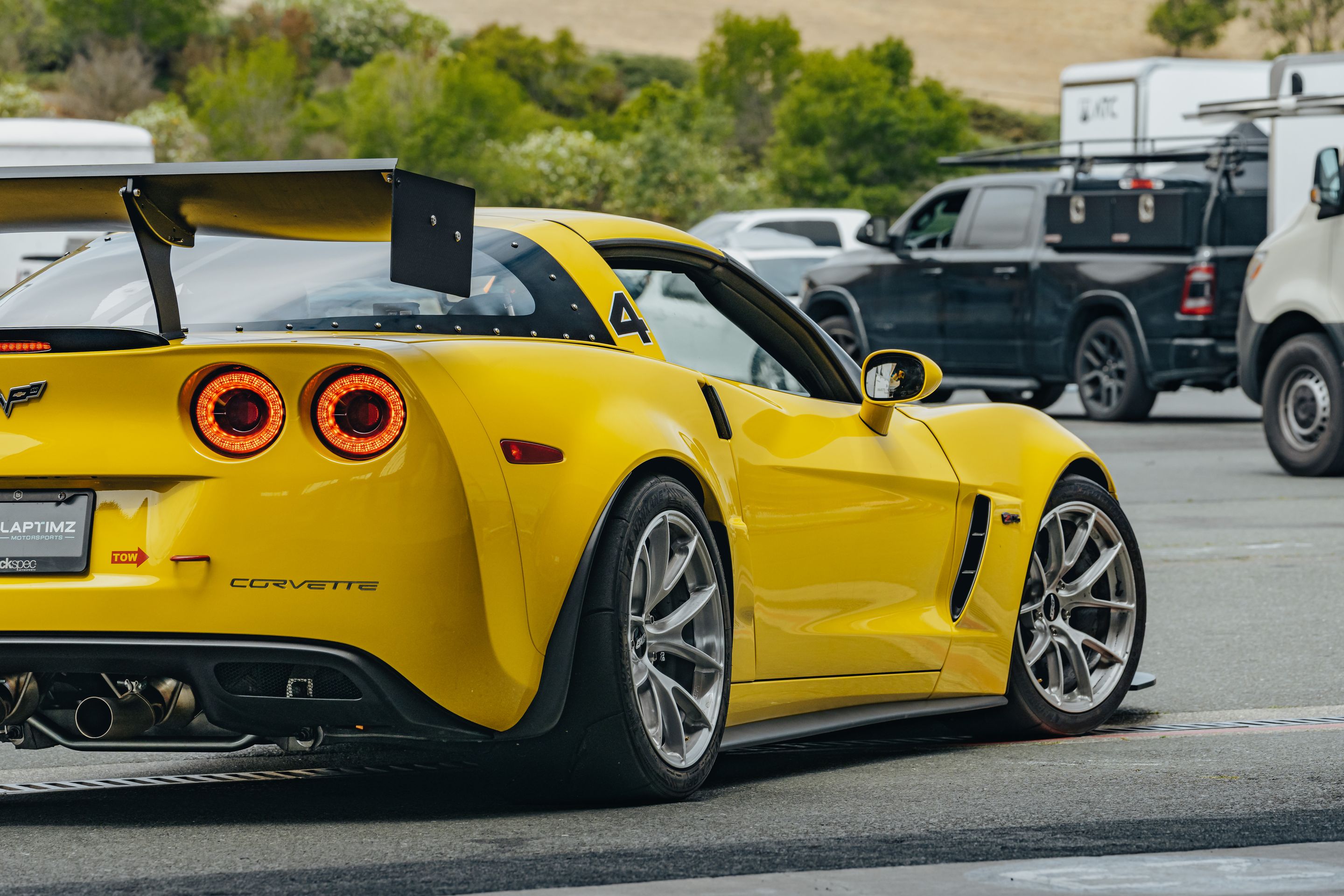 Yellow Chevrolet C6 Corvette Z06 with 18" VS-5RS Apex wheels in Brushed Clear