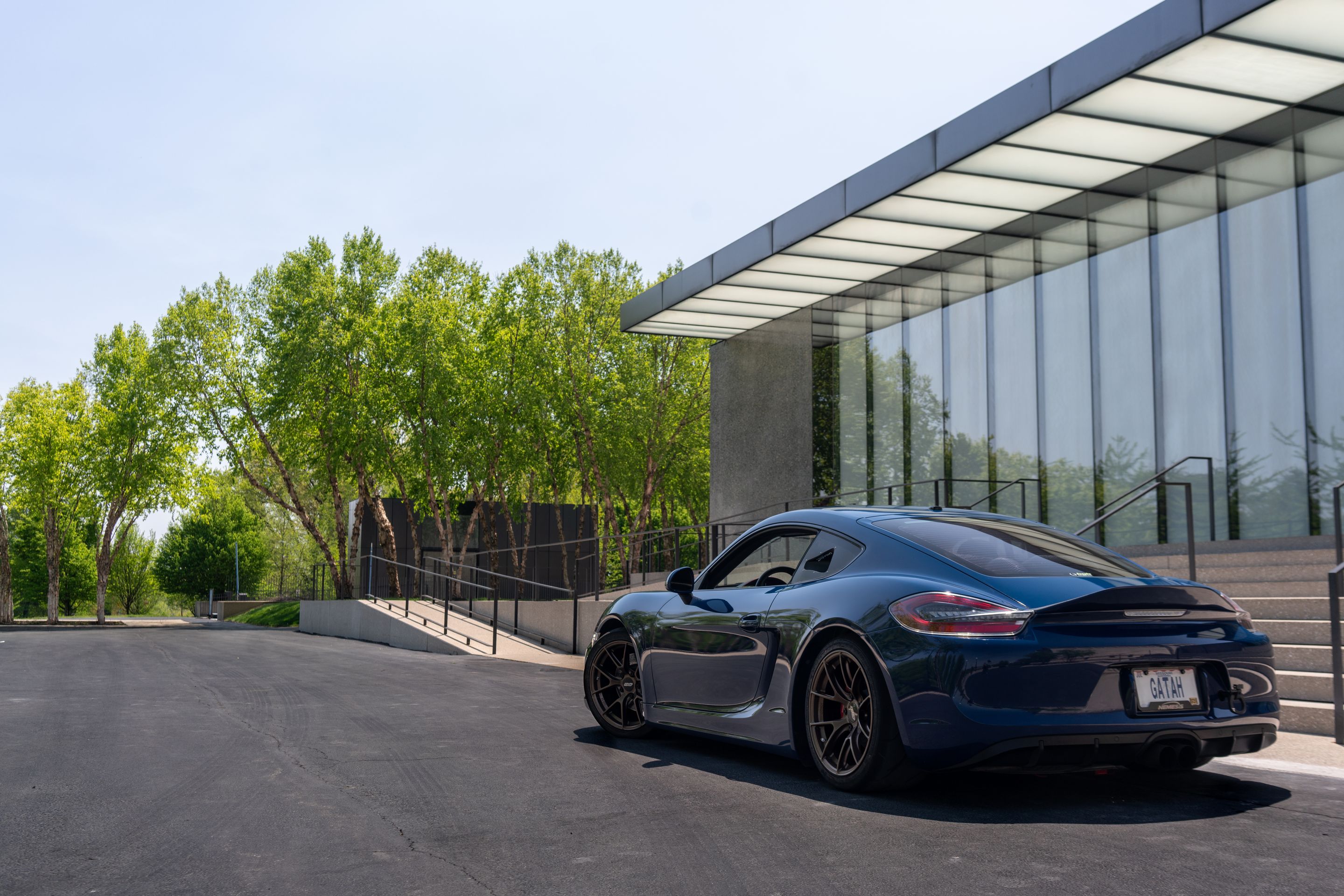 Blue Porsche 981 Cayman GTS with 18" VS-5RS Apex wheels in Satin Bronze