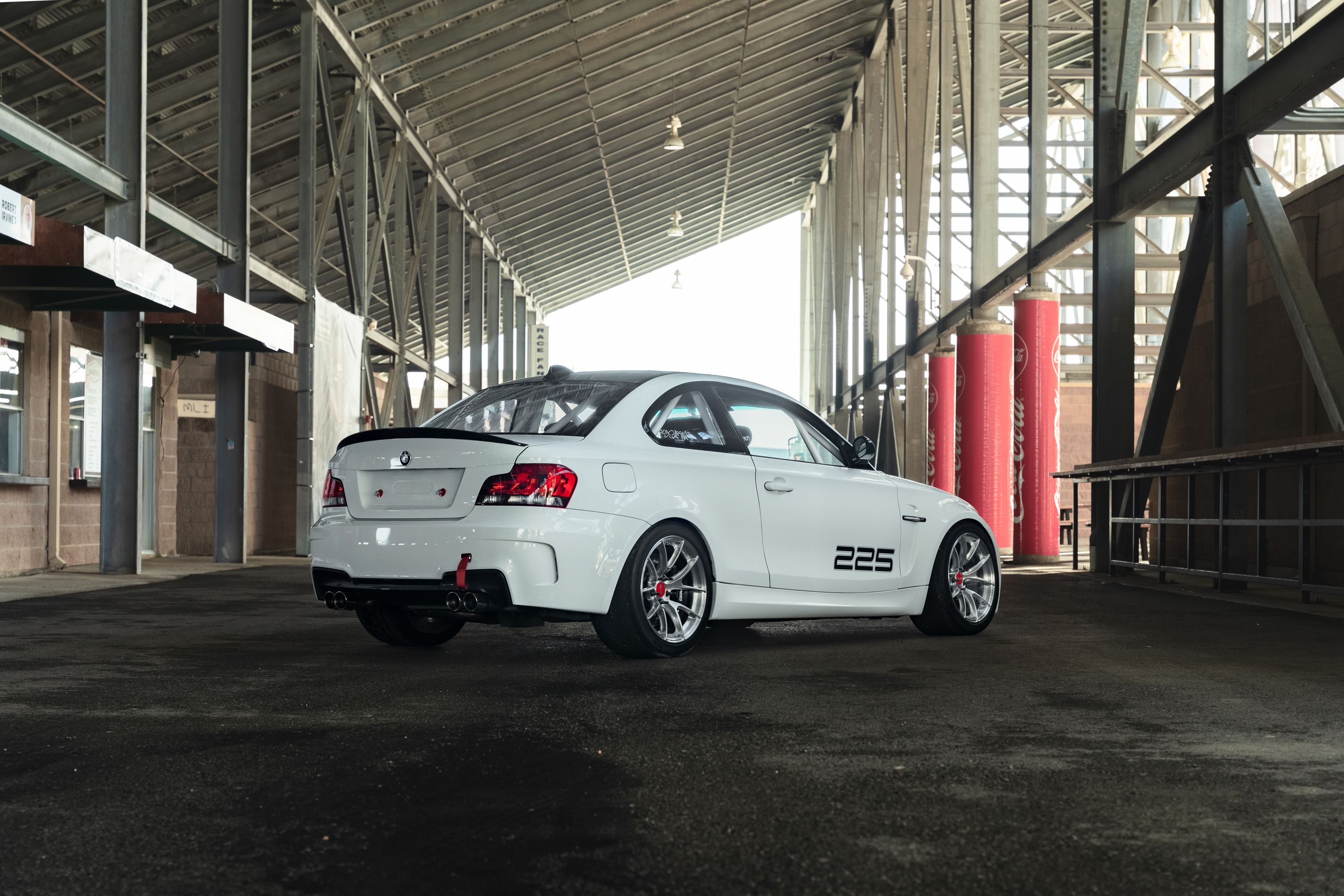 White BMW E82 1M with 18" VS-5RS Apex wheels in Brushed Clear