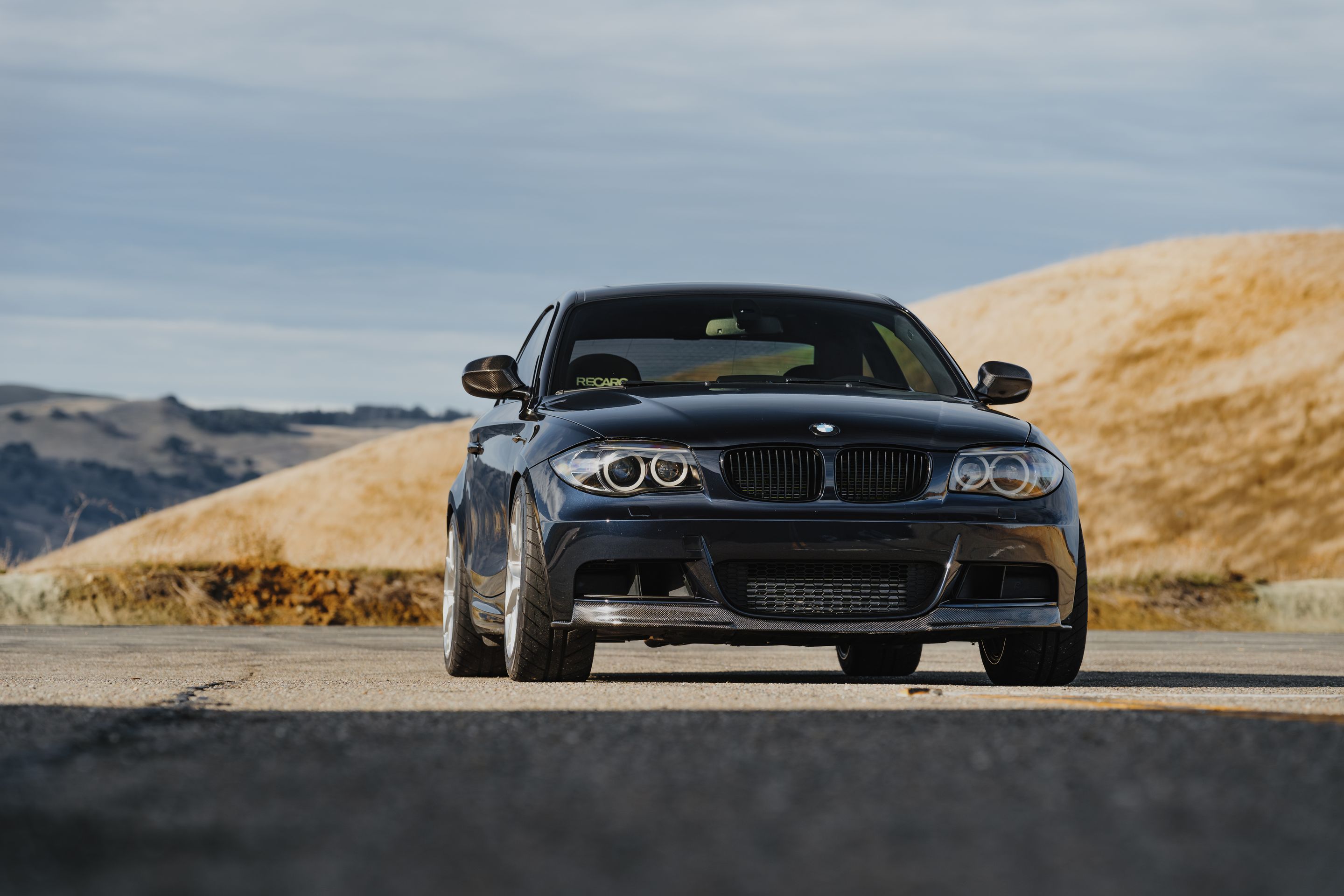Black BMW E82 Coupe 1 Series with 18" VS-5RS Apex wheels in Brushed Clear