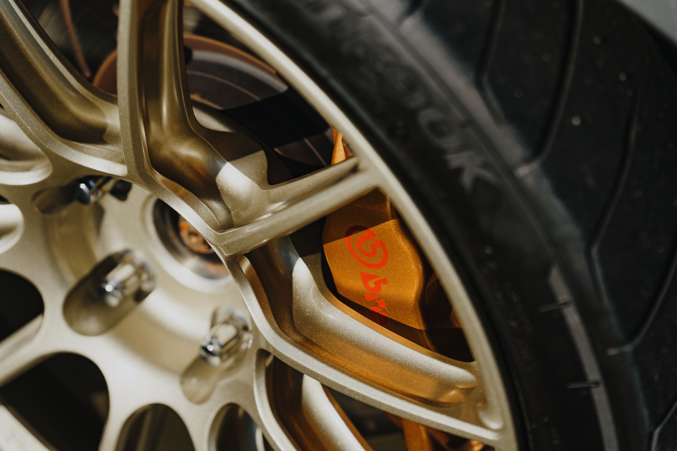 Silver Subaru GD WRX STI with 18" SM-10RS Apex wheels in Motorsport Gold