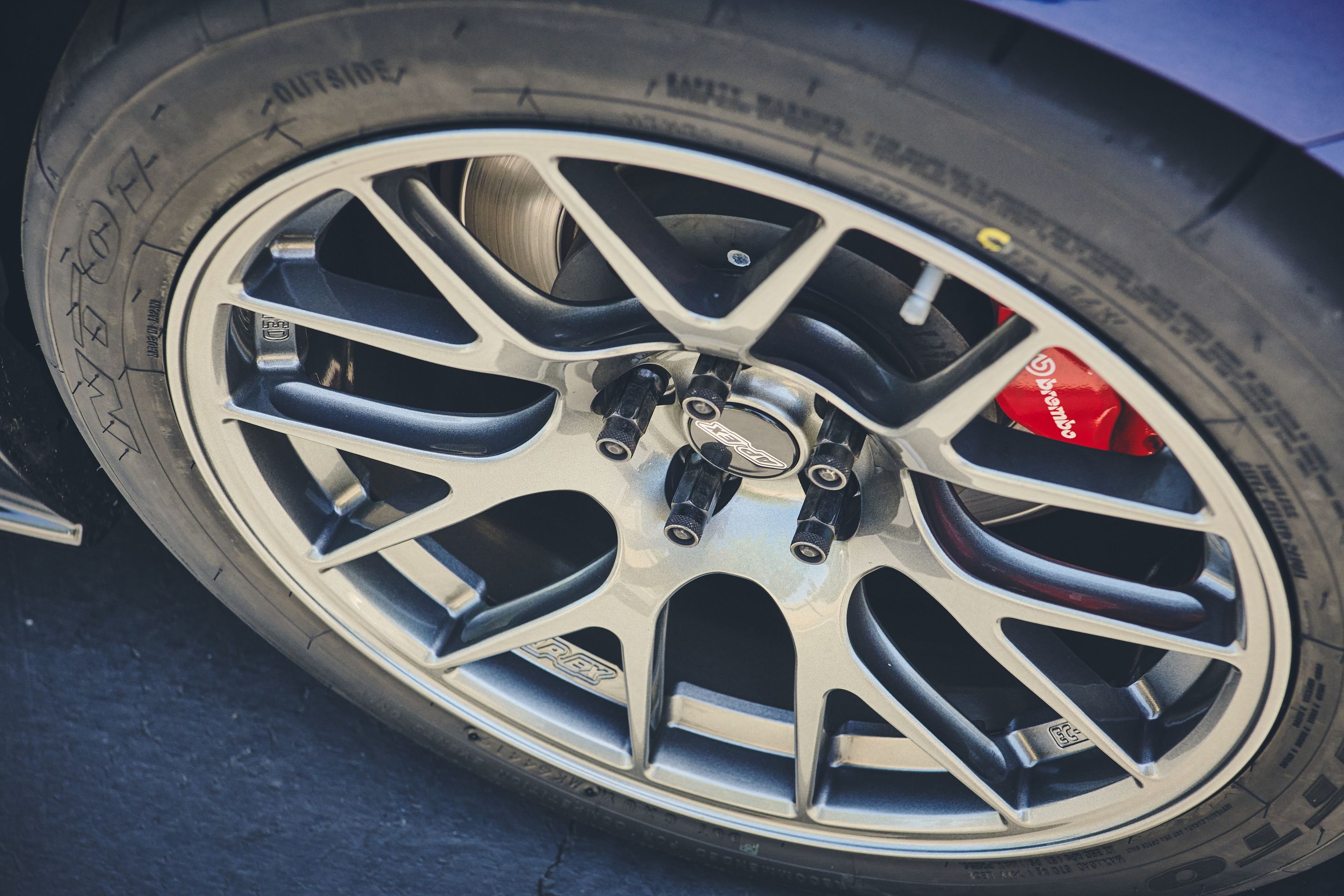 Blue Subaru ZC6 / Gen 1 BRZ with 17" EC-7R Apex wheels in Anthracite