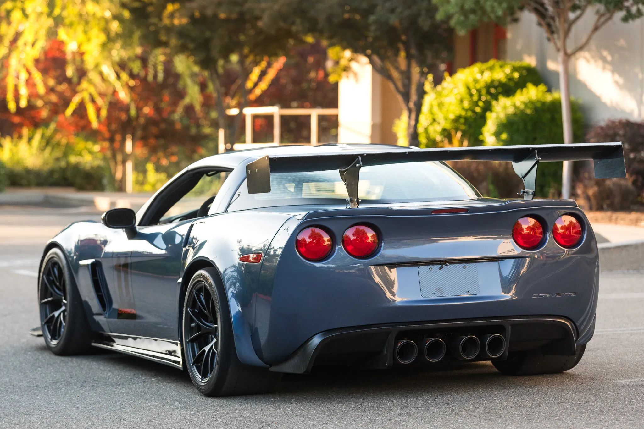 Blue Chevrolet C6 Corvette Z06 with 18" VS-5RS Apex wheels in Satin Black
