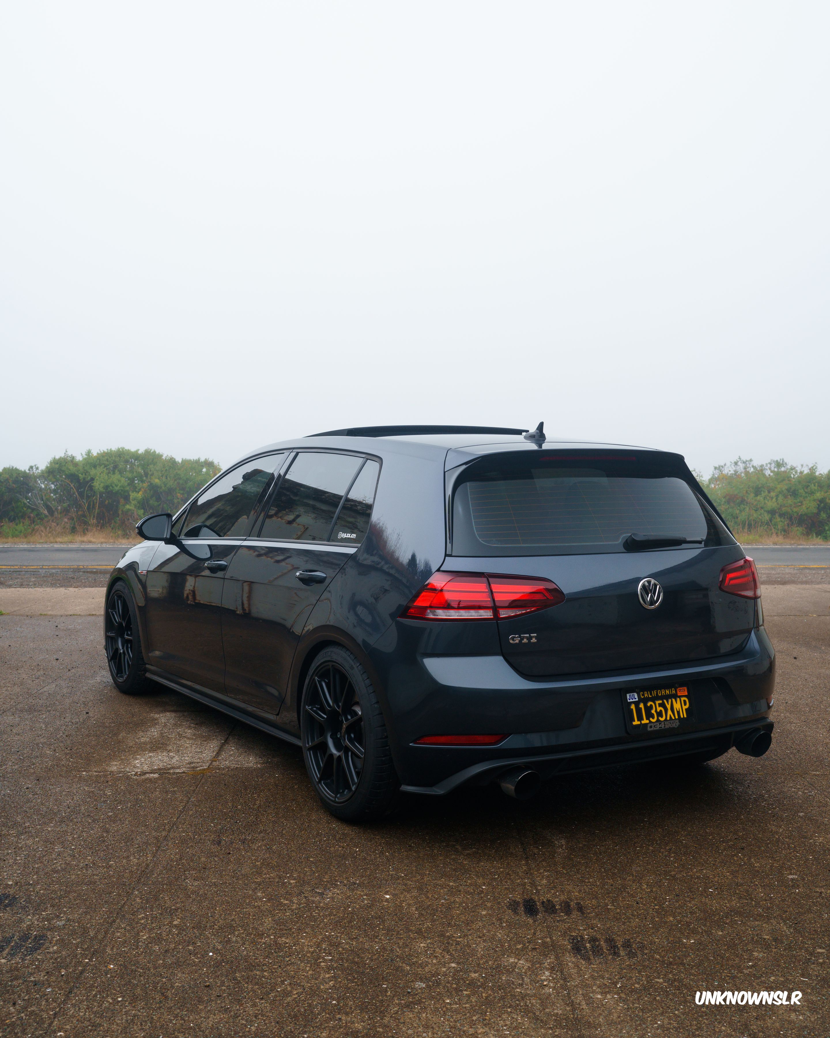 Blue VW MK7 GTI with 18" SM-10 Apex wheels in Satin Black