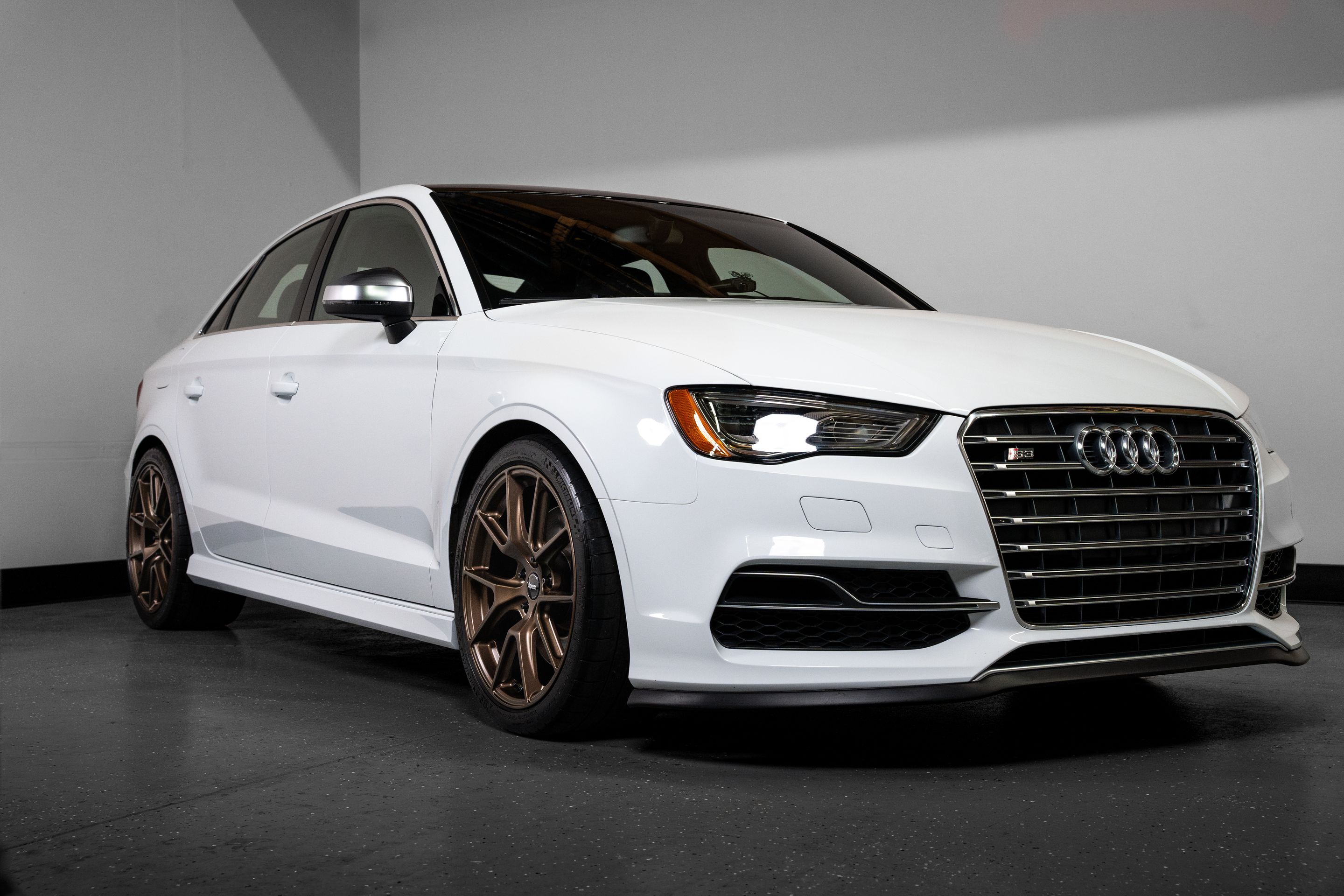White Audi 8V S3 with 18" VS-5 Apex wheels in Satin Bronze
