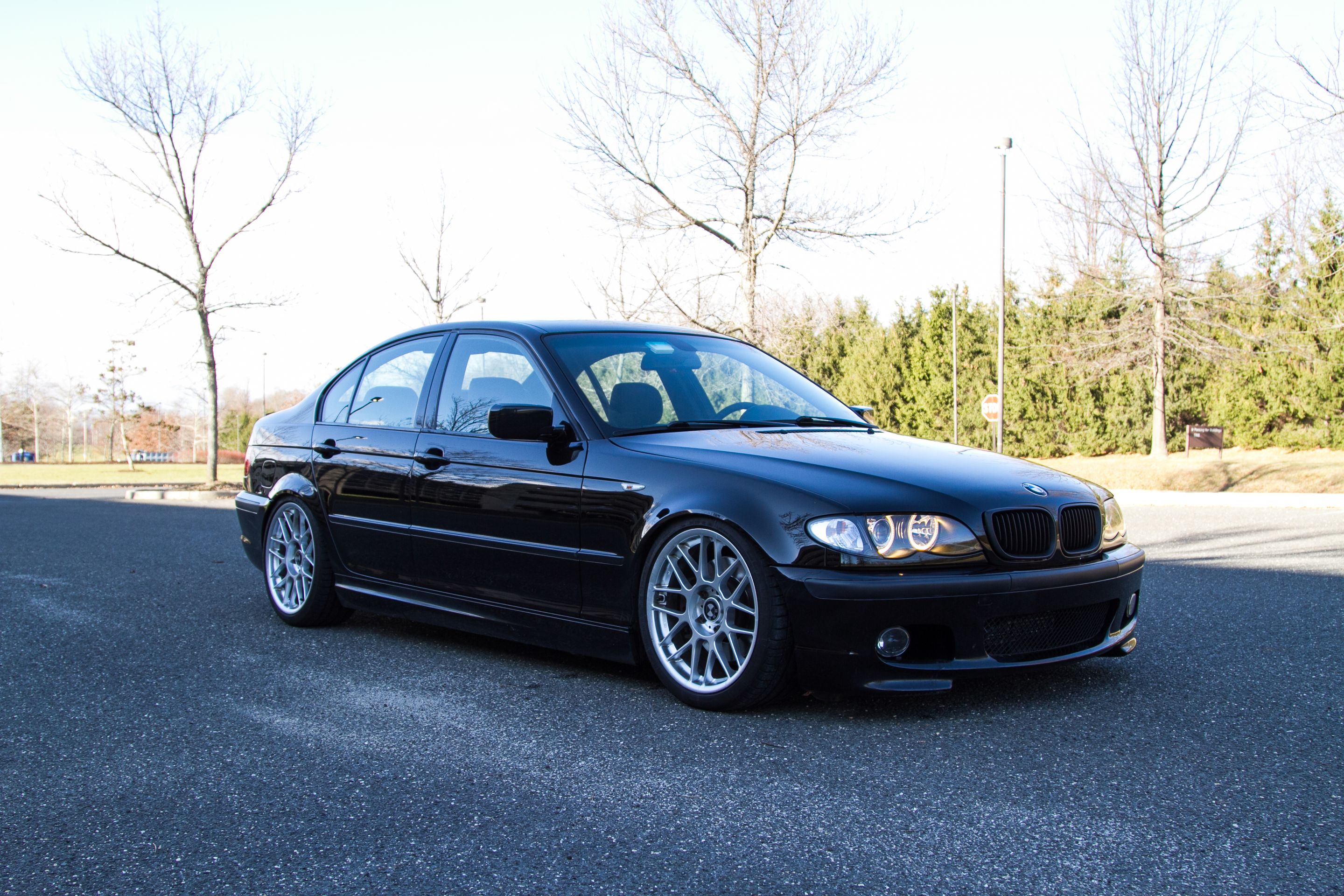 Black BMW E46 3 Series with 18" ARC-8 Apex wheels in Hyper Silver