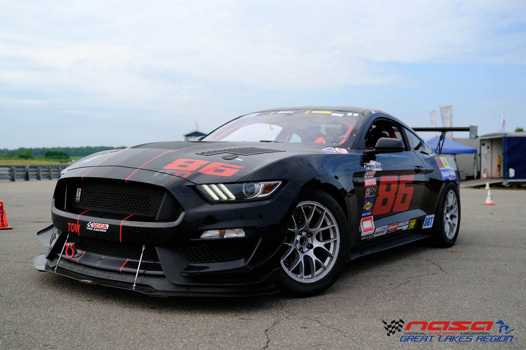 Black Ford S550 Mustang GT350 with 18" EC-7 Apex wheels in Race Silver