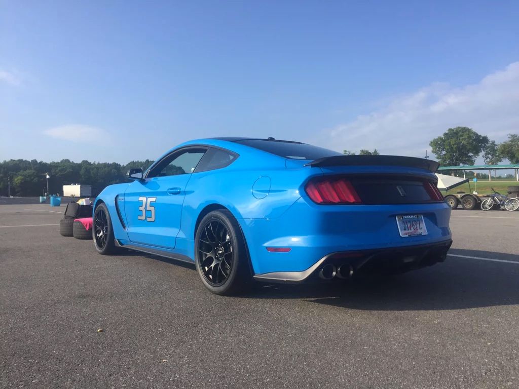 Blue Ford S550 Mustang GT350 with 19" EC-7 Apex wheels in Satin Black