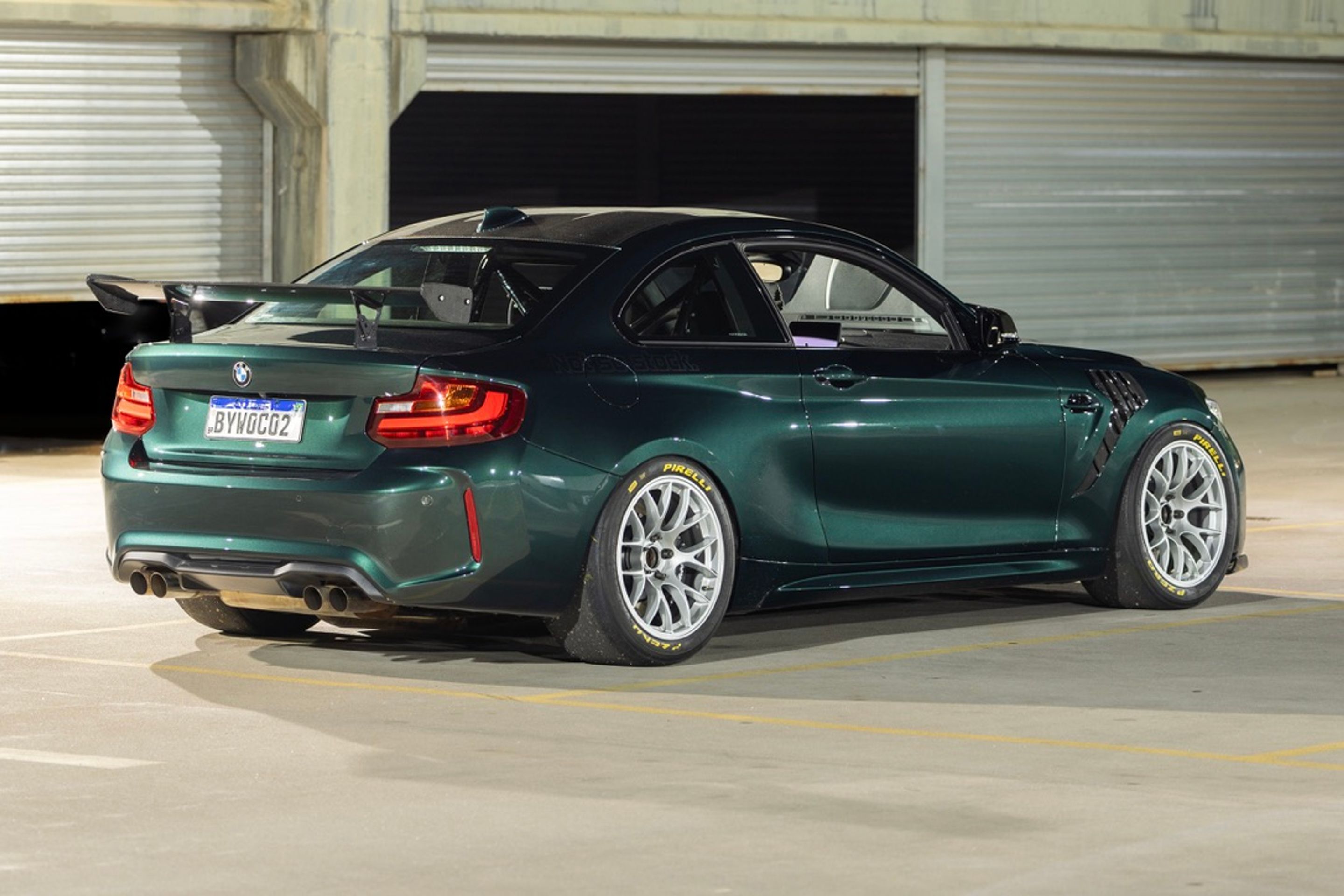 Green BMW F87 M2 with 18" EC-7 Apex wheels in Race Silver