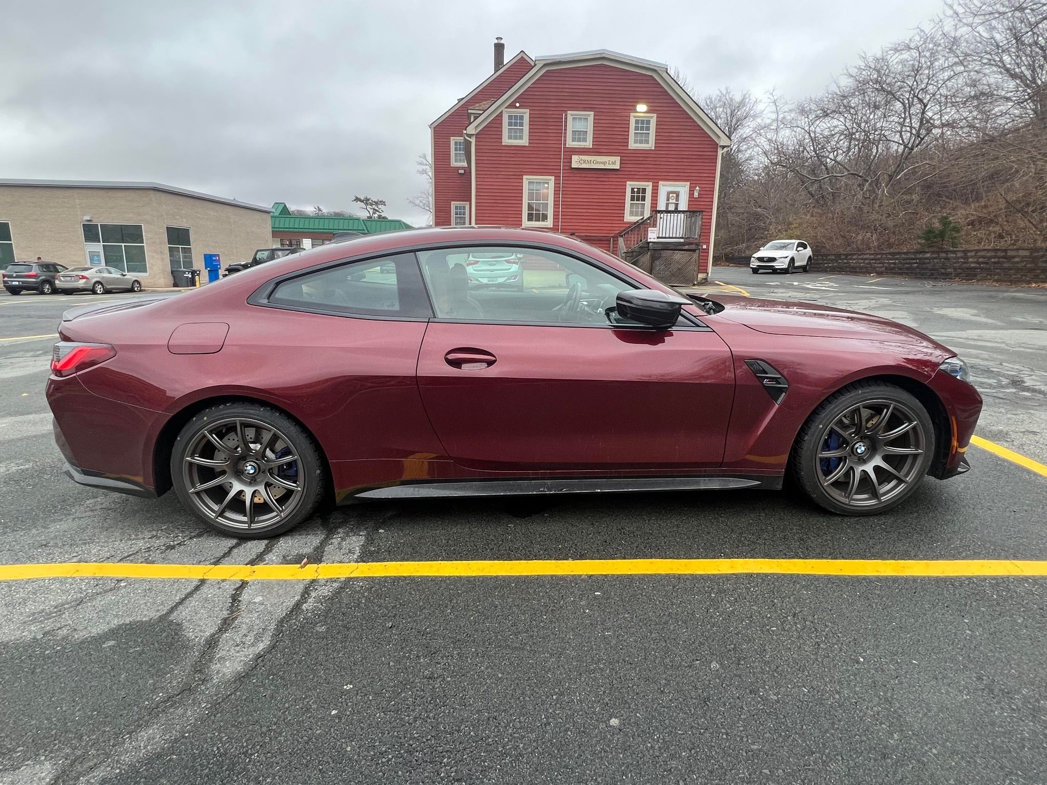 Red BMW G82 Coupe M4 with 19" SM-10 Apex wheels in Anthracite