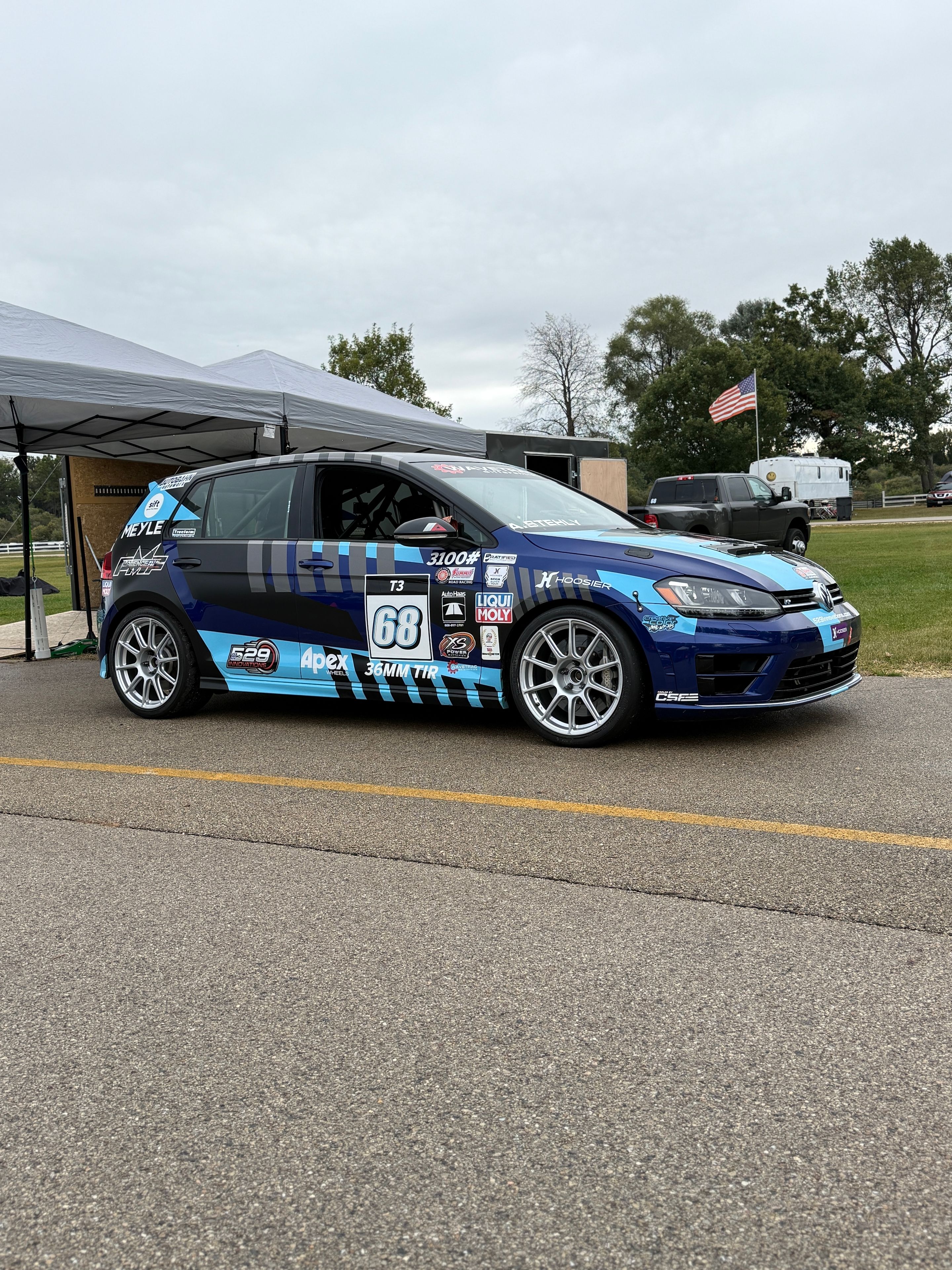 Race Livery VW MK7 Golf R with 18" SM-10 Apex wheels in Race Silver