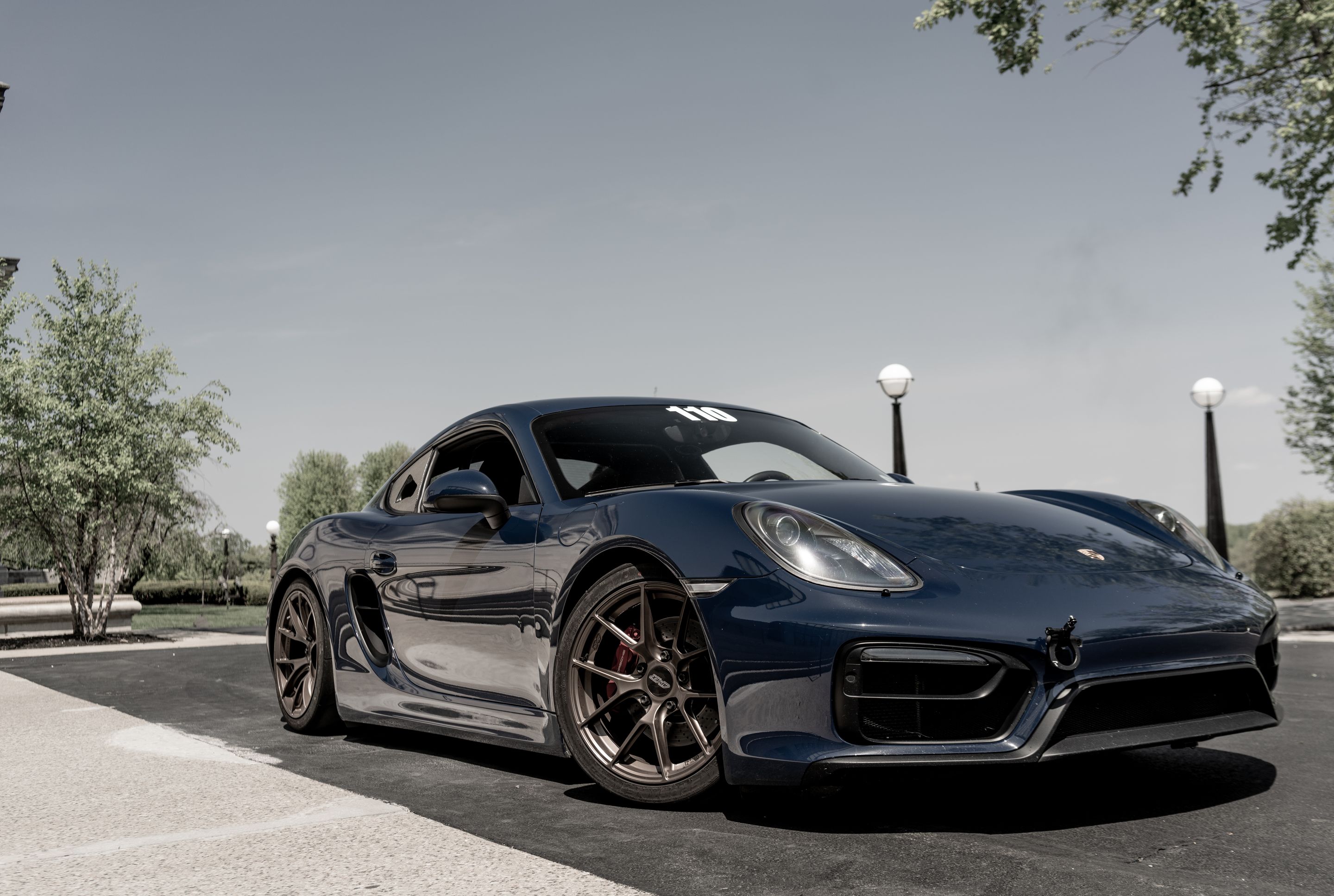 Blue Porsche 981 Cayman GTS with 18" VS-5RS Apex wheels in Satin Bronze