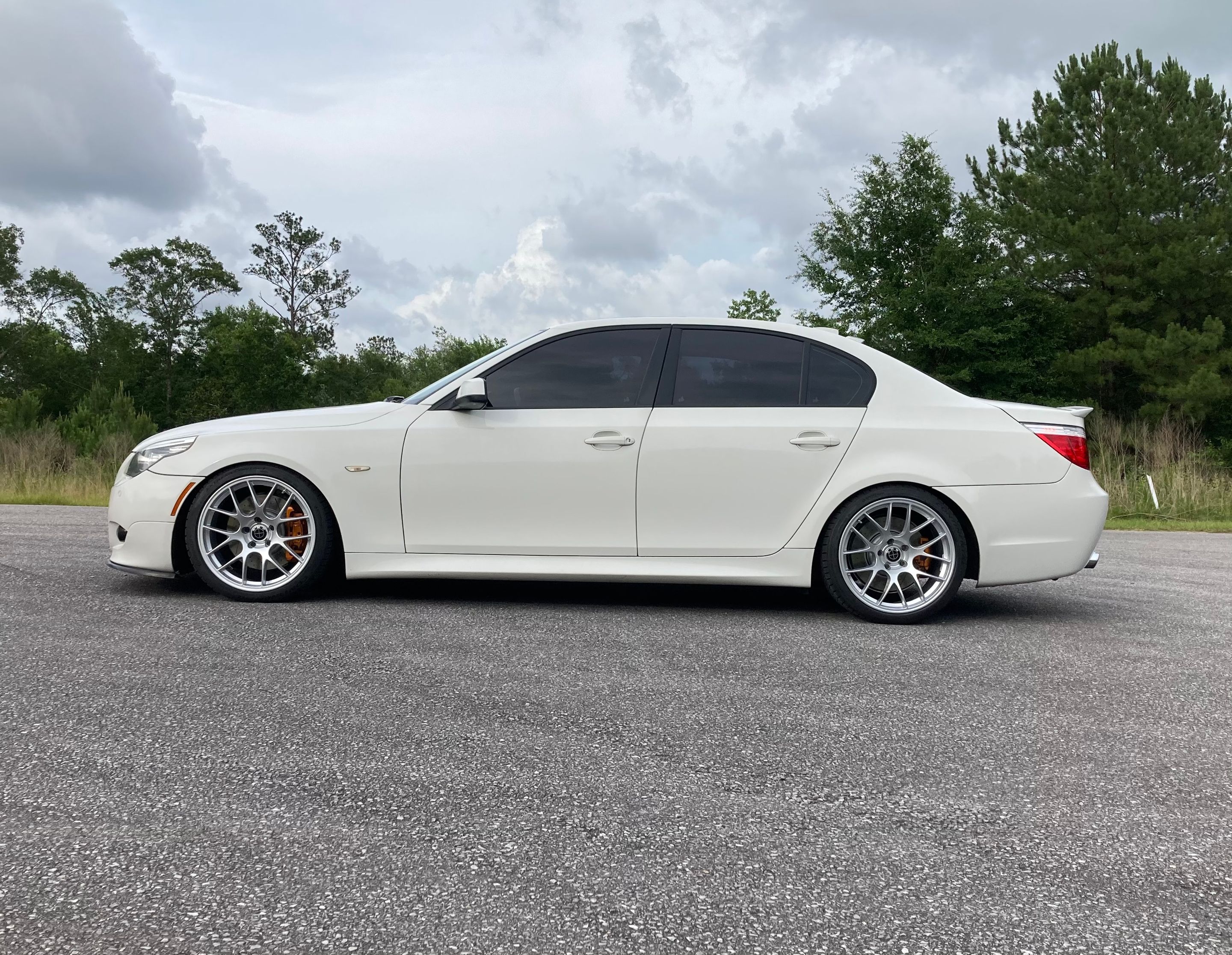 White BMW E60 Sedan 5 Series with 19" EC-7 Apex wheels in Race Silver