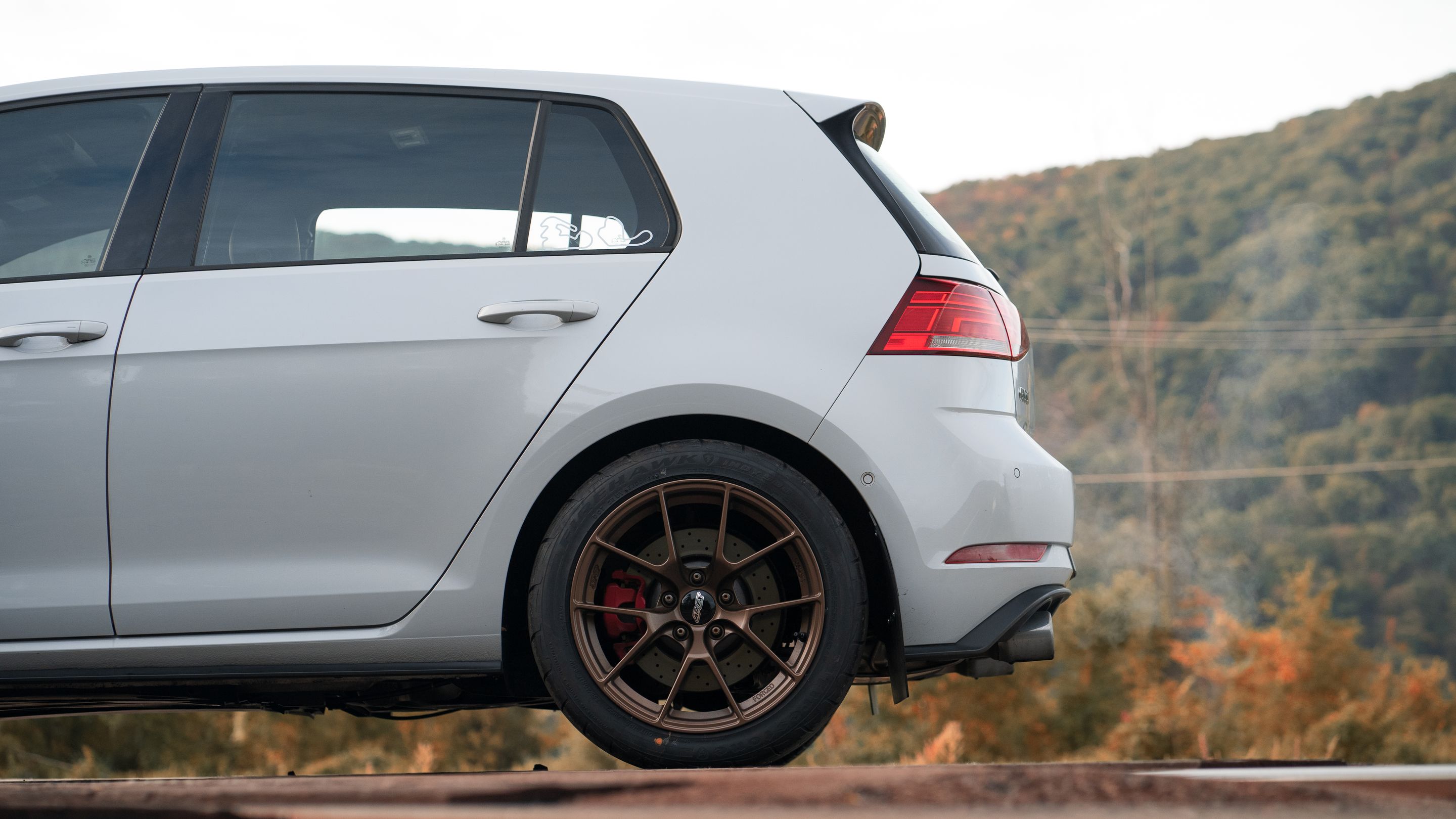 Grey VW MK7 GTI with 17" VS-5RS Apex wheels in Satin Bronze