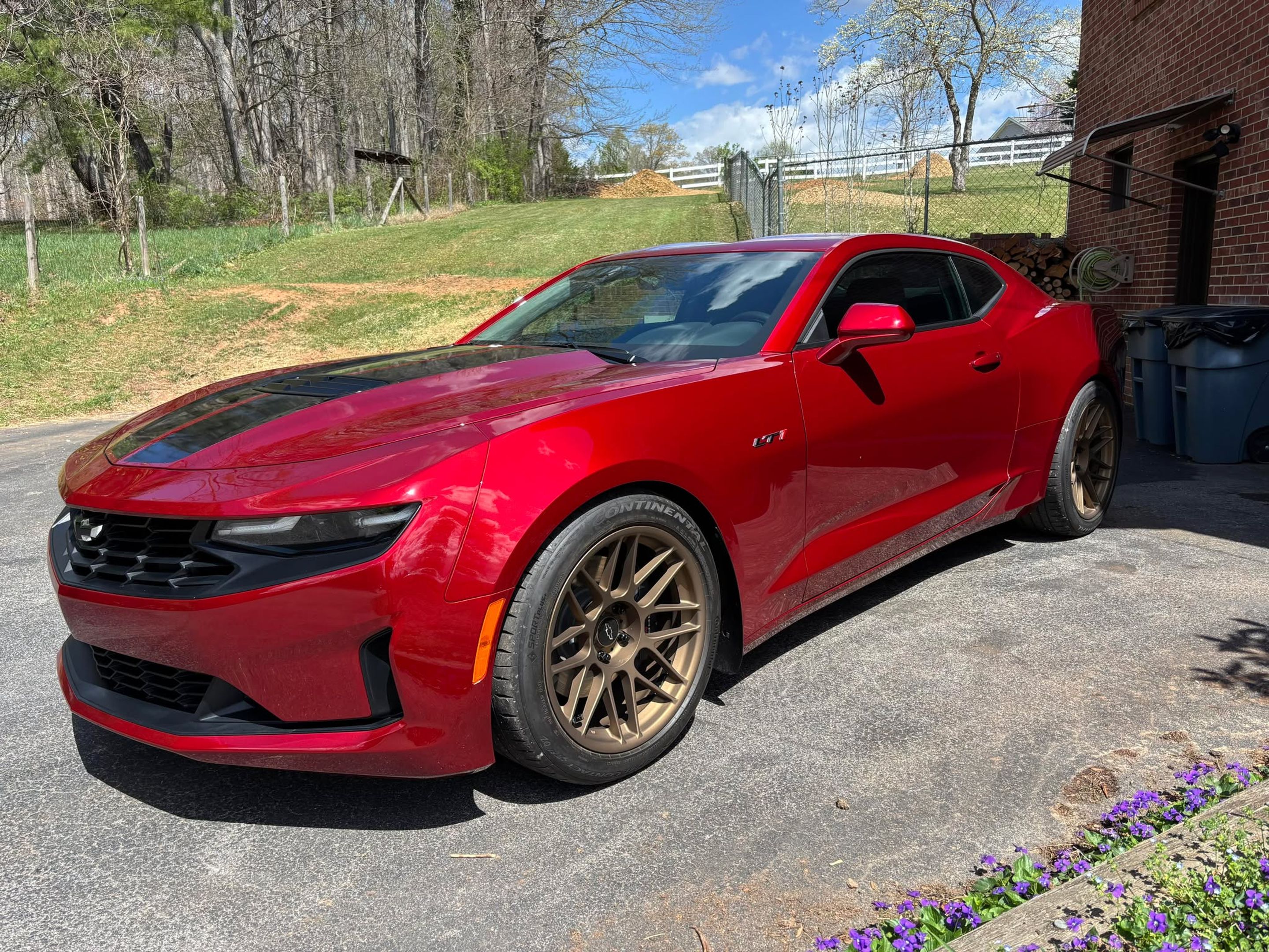 Red Chevrolet 6th Gen Camaro LT1 with 19" ARC-8 Apex wheels in Satin Bronze