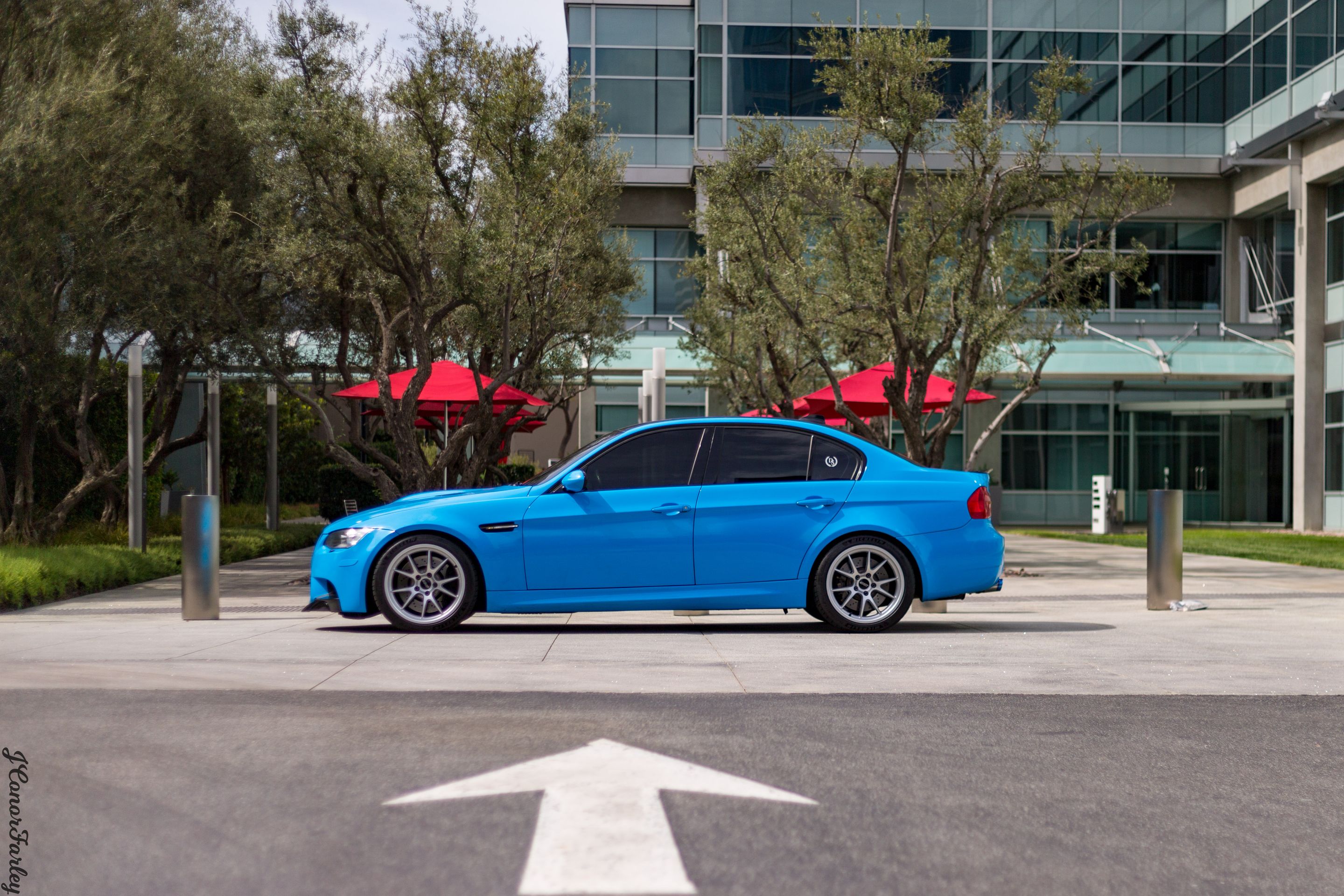 Blue BMW E90 Sedan M3 with 18" FL-5 Apex wheels in Race Silver
