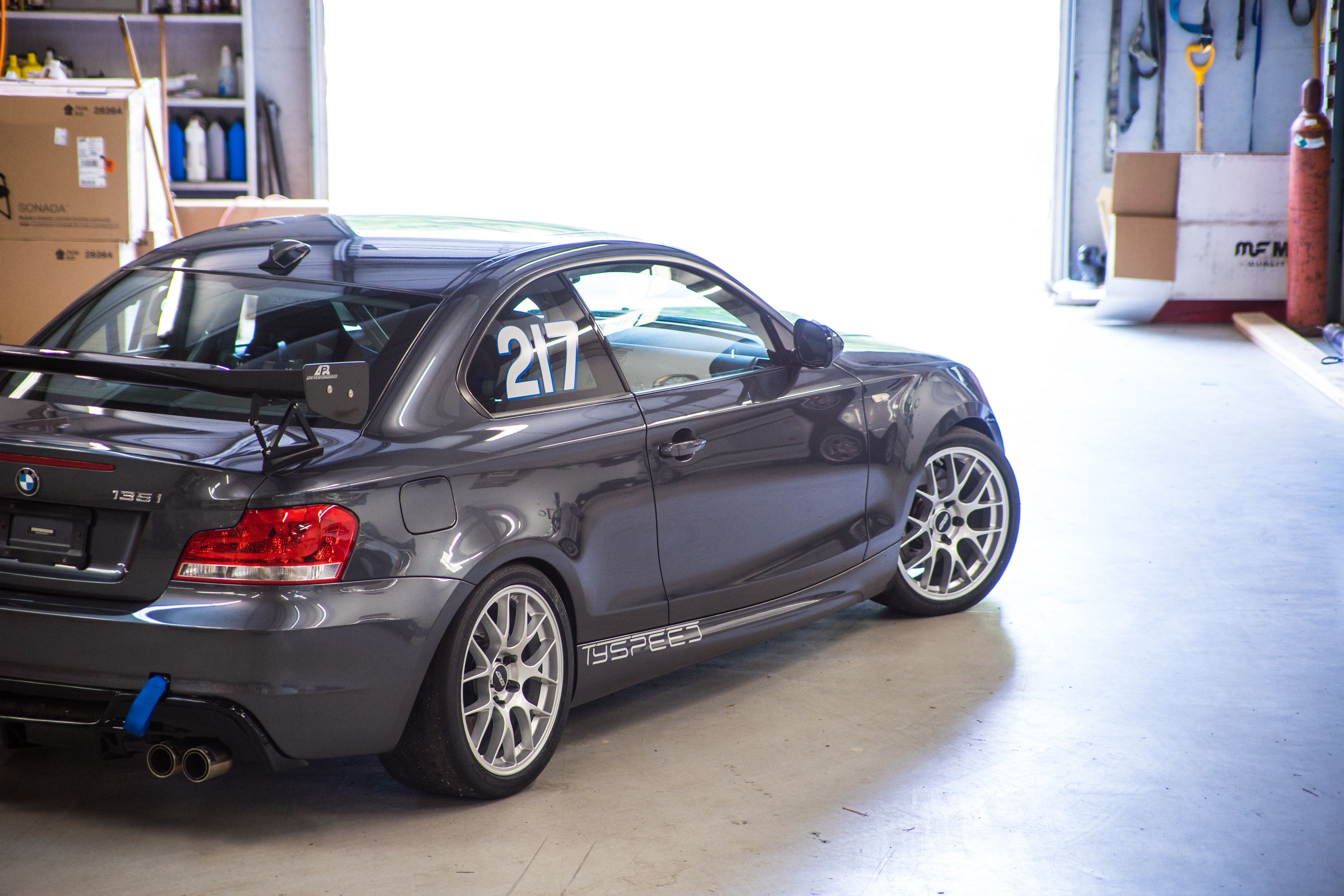 Grey BMW E82 Coupe 1 Series with 18" EC-7 Apex wheels in Race Silver