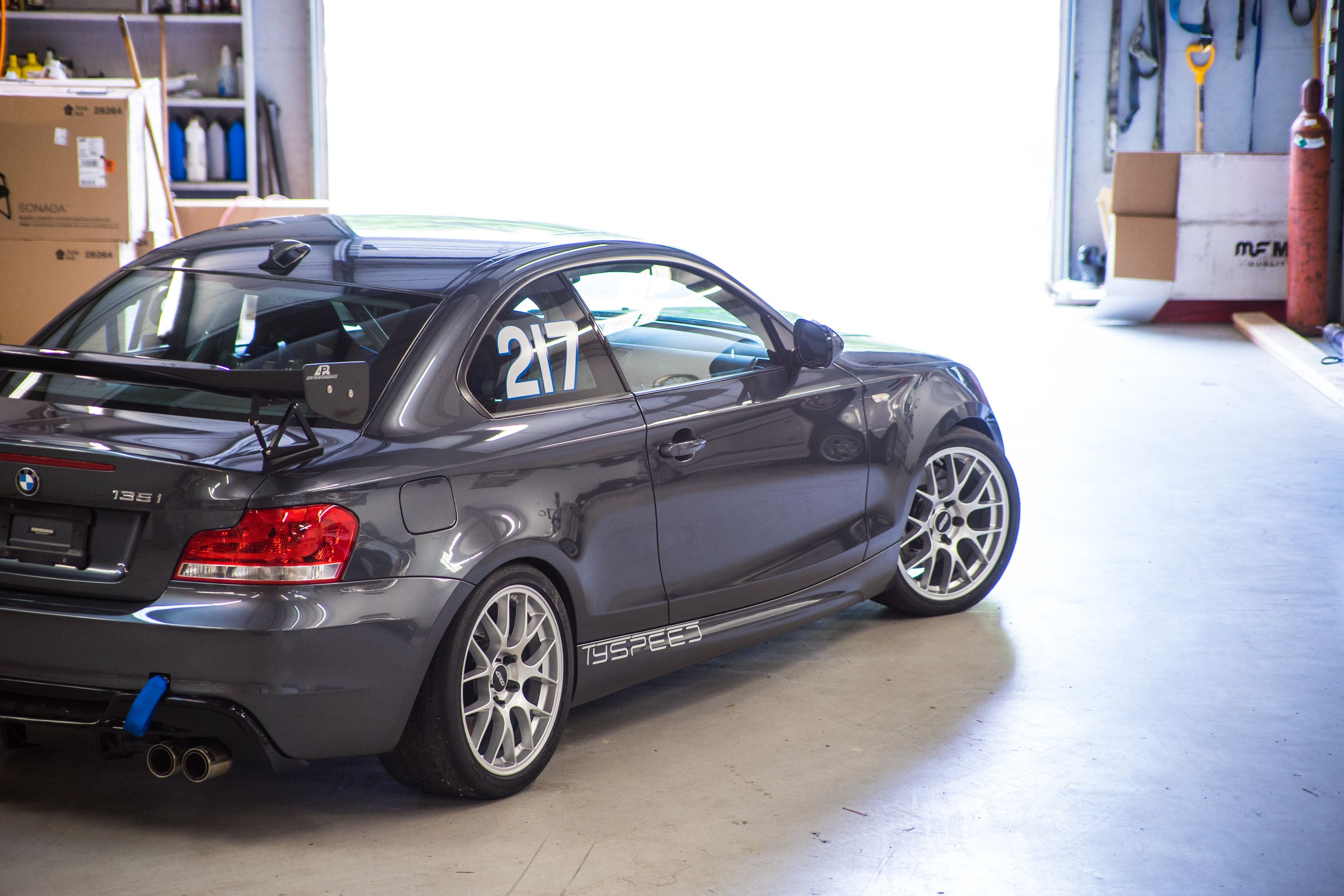 Grey BMW E82 Coupe 1 Series with 18" EC-7 Apex wheels in Race Silver