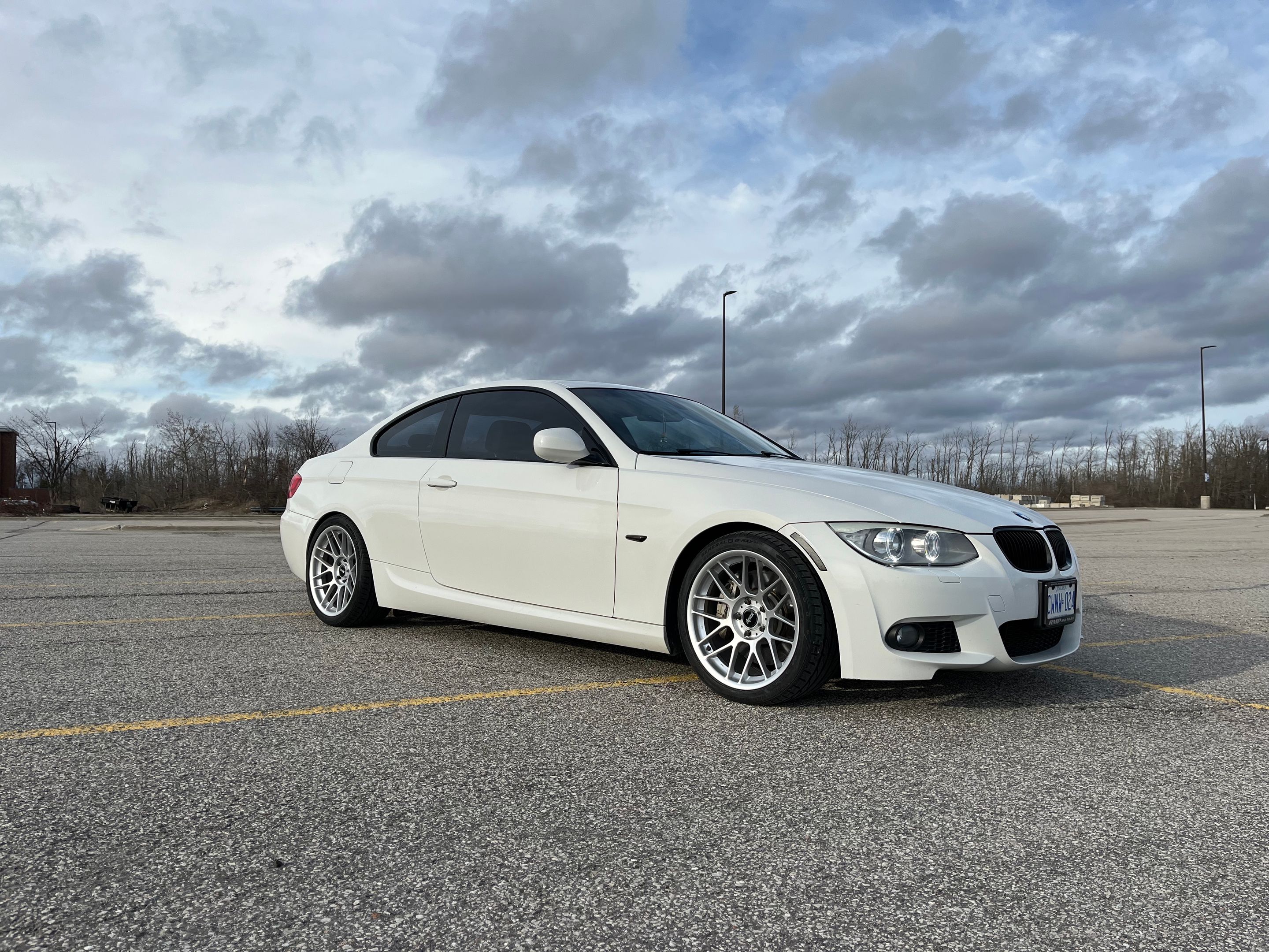 White BMW E92 Coupe 3 Series with 18" ARC-8 Apex wheels in Race Silver