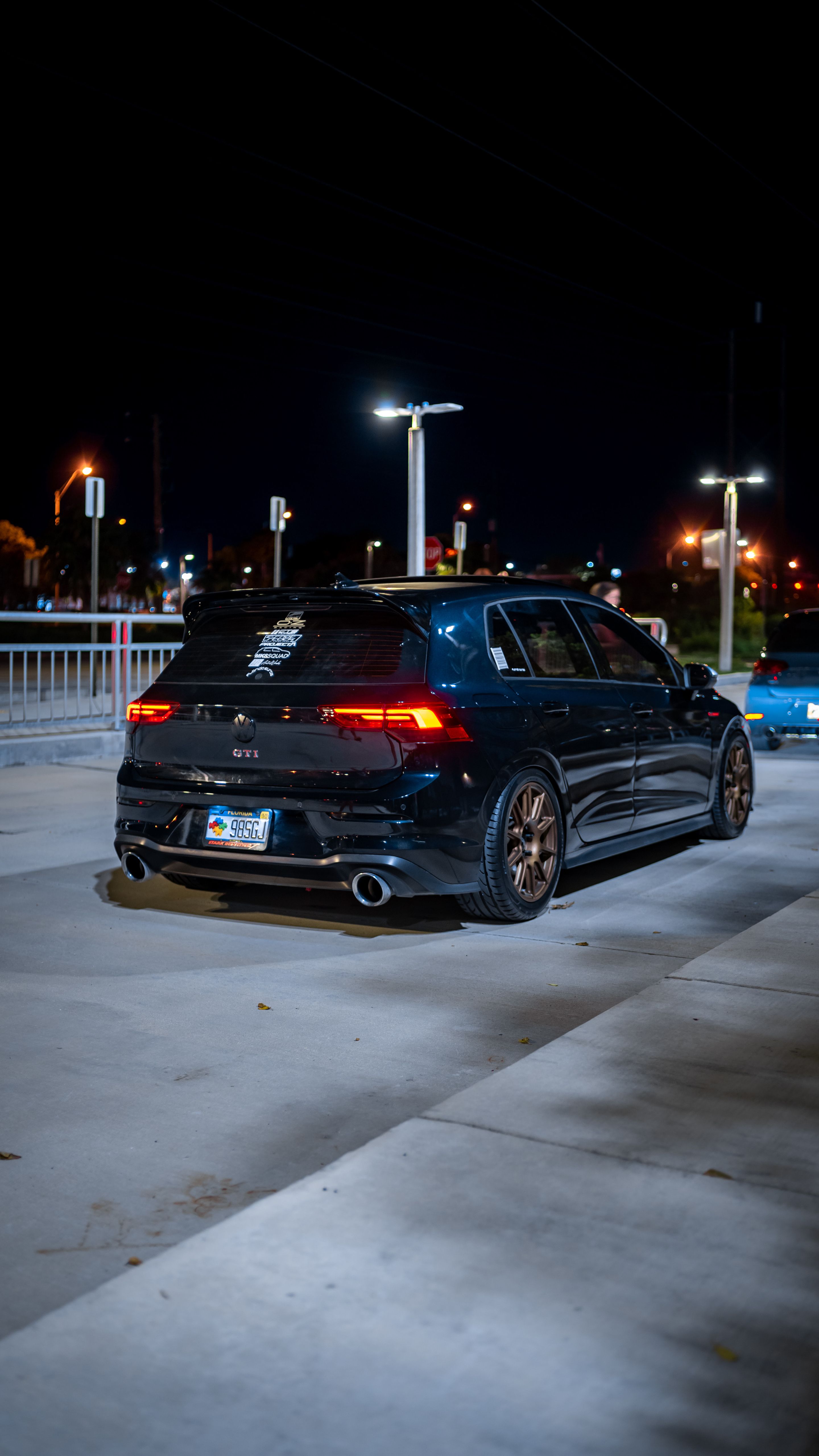 Black VW MK8 GTI with 17" SM-10 Apex wheels in Satin Bronze