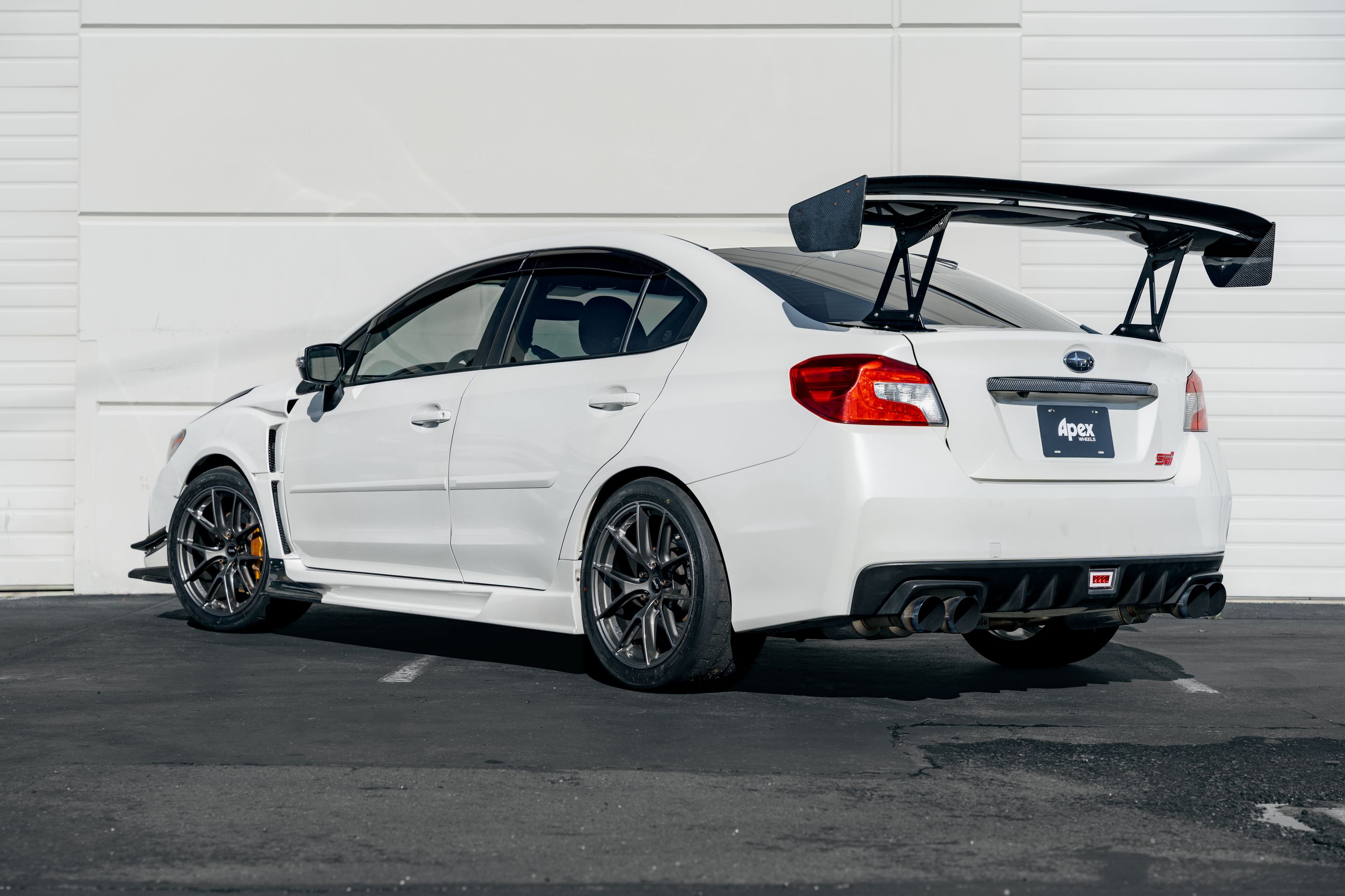 White Subaru VA WRX STI with 18" VS-5RS Apex wheels in Anthracite