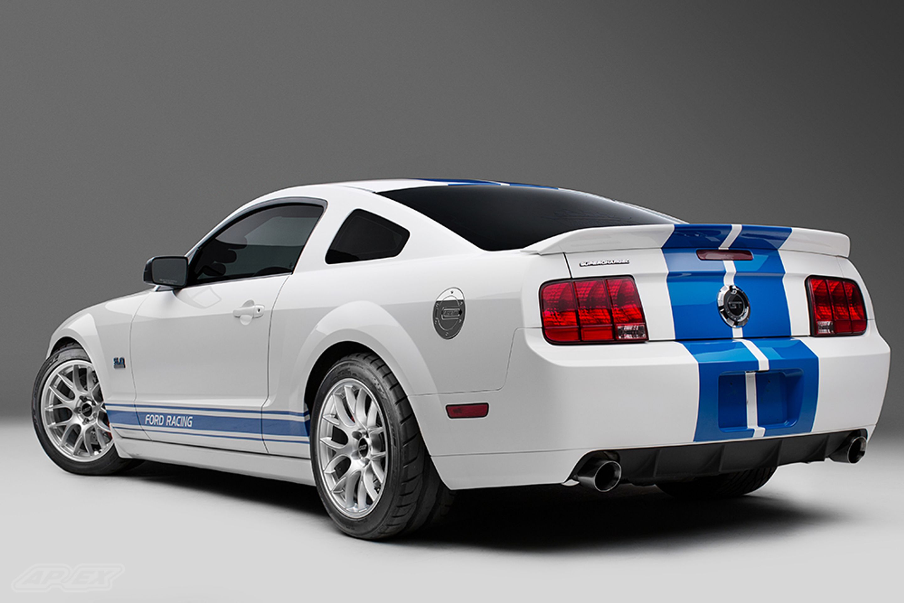 White Ford S197 Mustang GT with 18" EC-7 Apex wheels in Race Silver