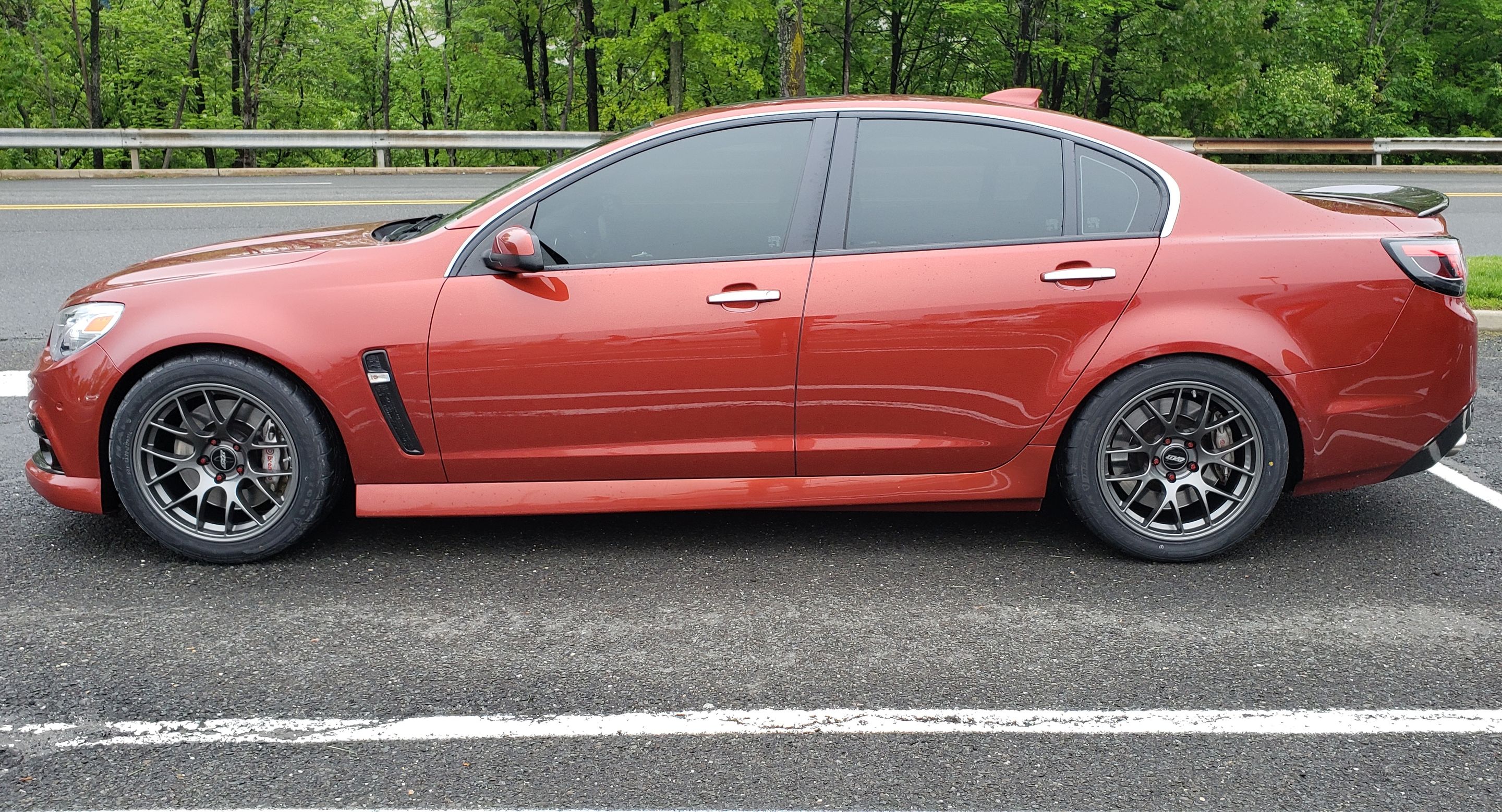 Orange Chevrolet SS with 18" EC-7 Apex wheels in Anthracite