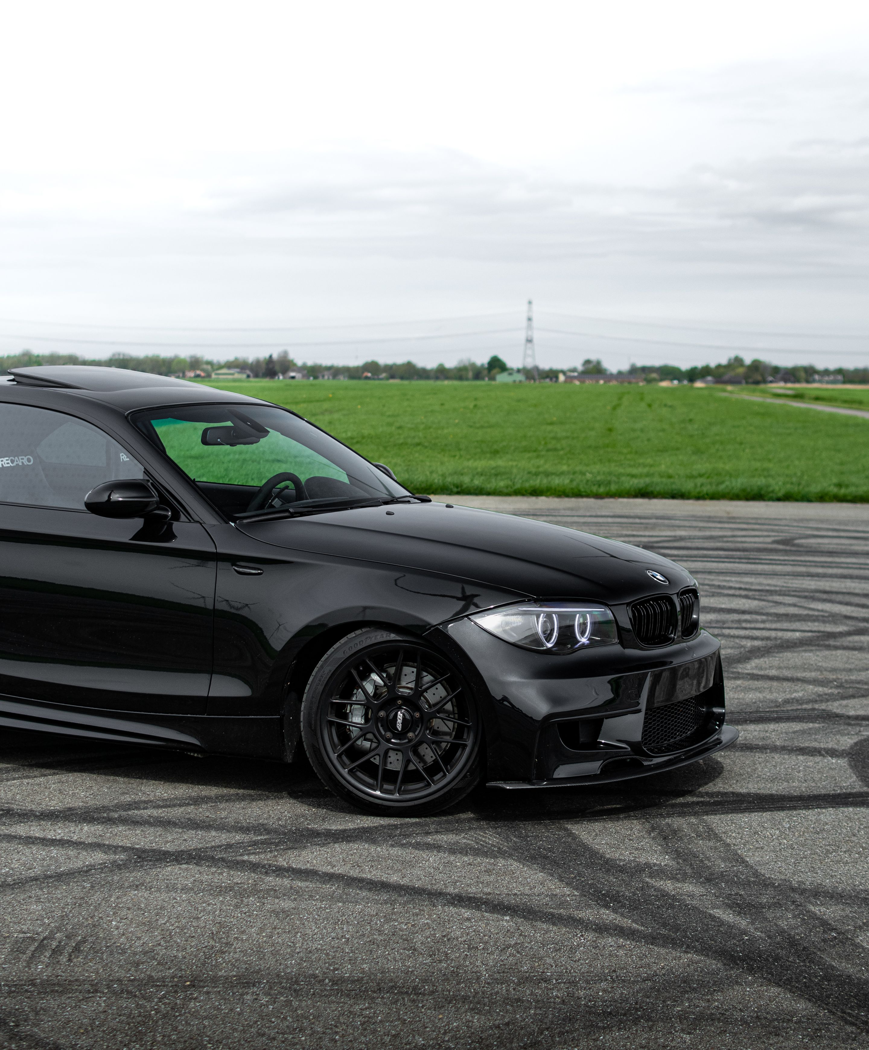 Black BMW E82 Coupe 1 Series with 18" ARC-8 Apex wheels in Satin Black