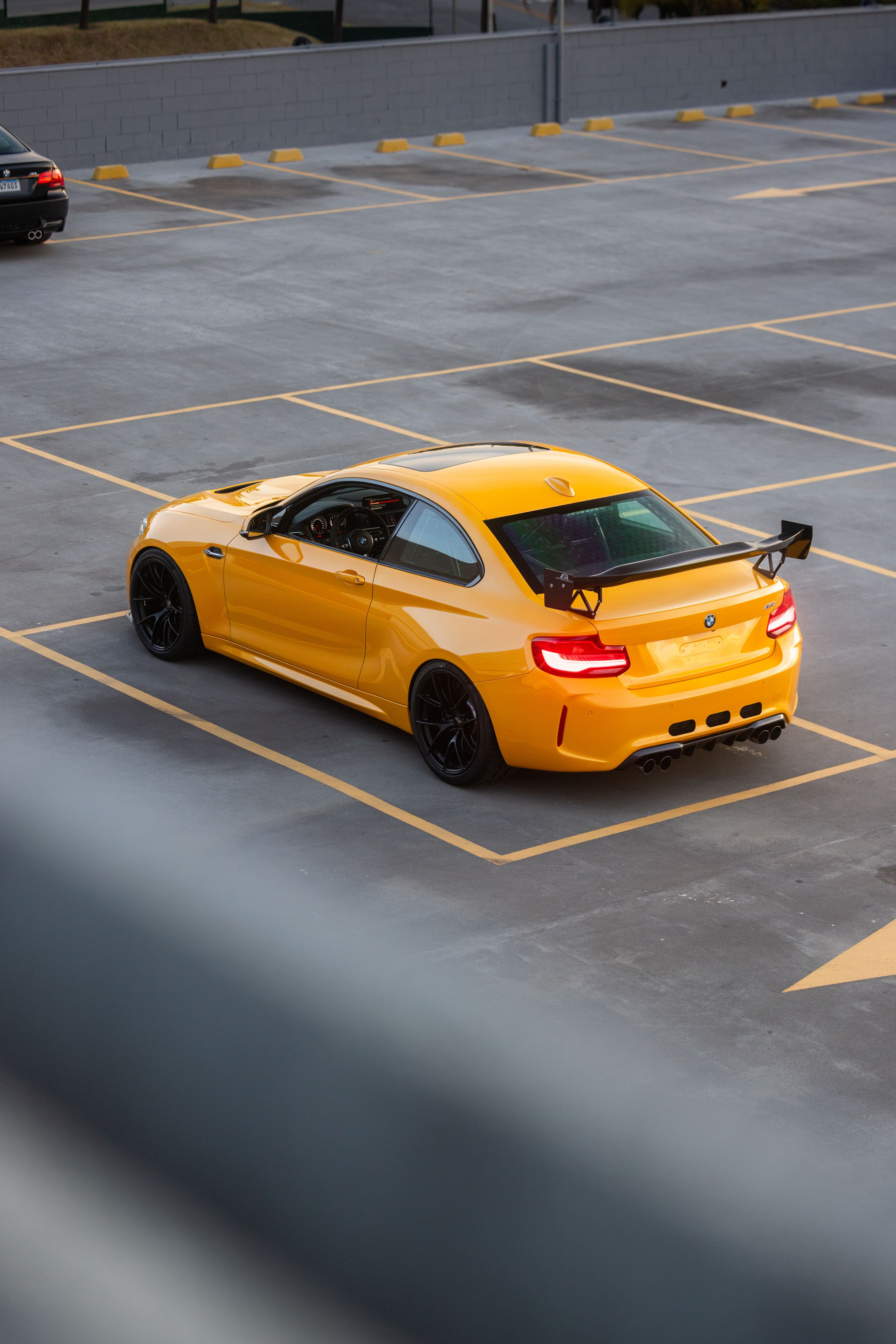 Yellow BMW F87 M2 with 19" VS-5RS Apex wheels in Satin Black