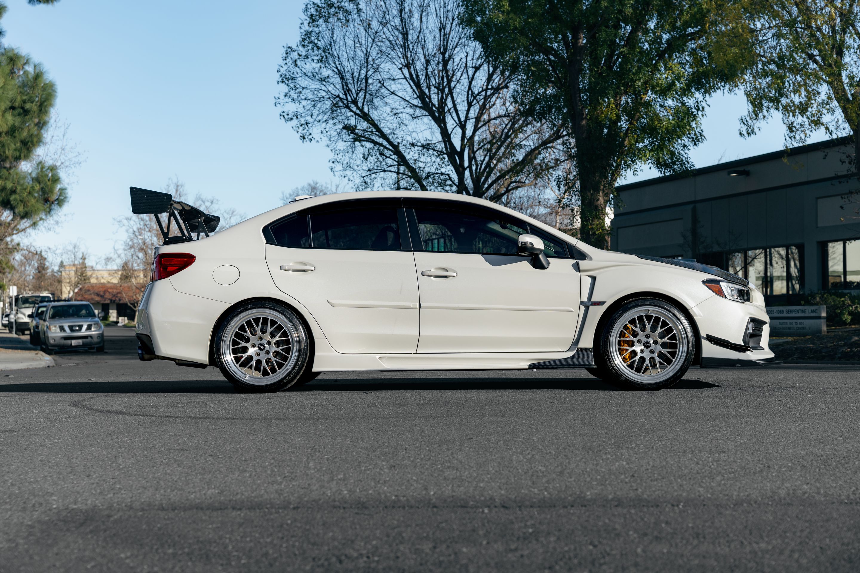White Subaru VA WRX STI with 19" ML-10RT Apex wheels in Machined Lip Brushed Clear