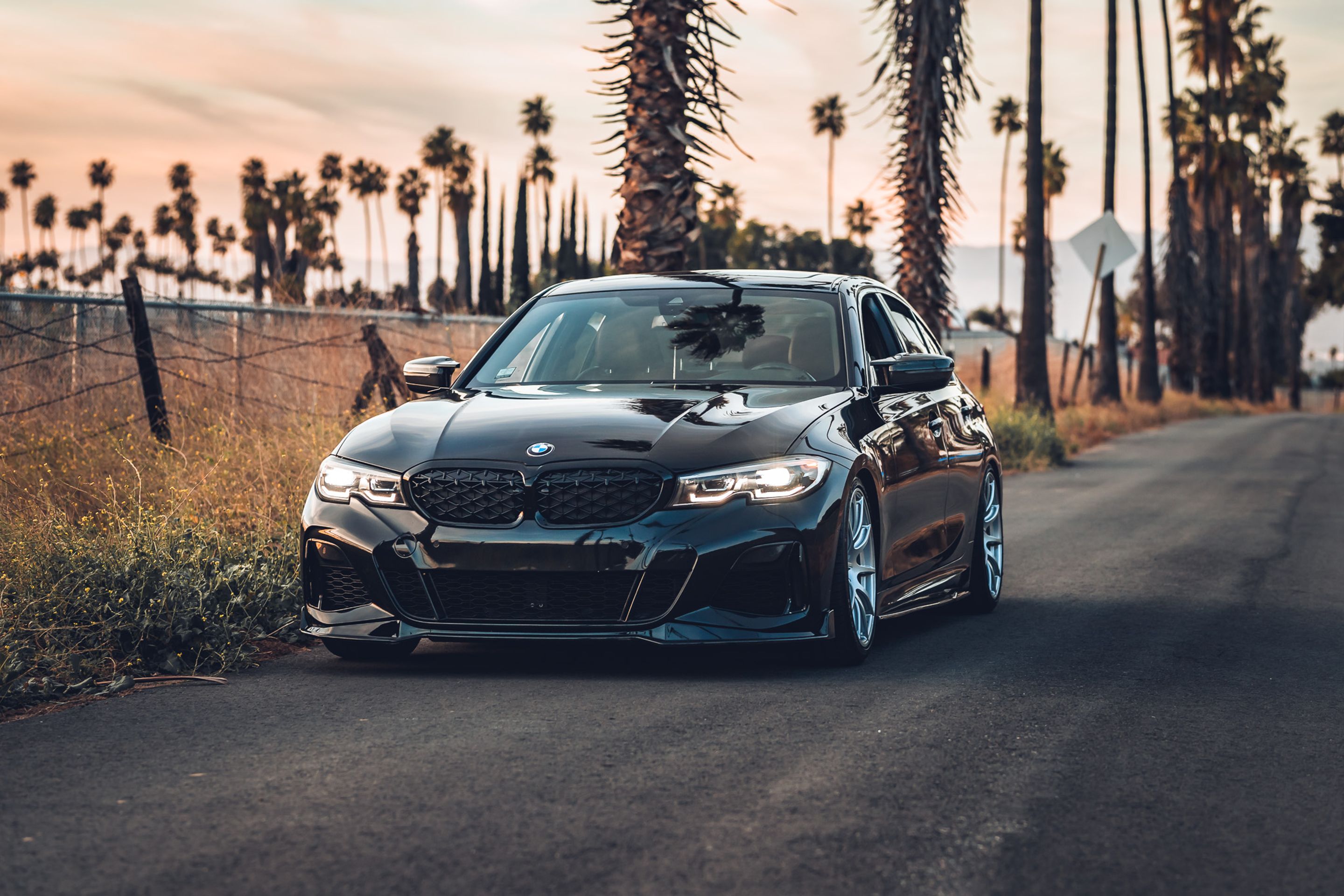 Black BMW G20 Sedan 3 Series with 19" SM-10 Apex wheels in Race Silver