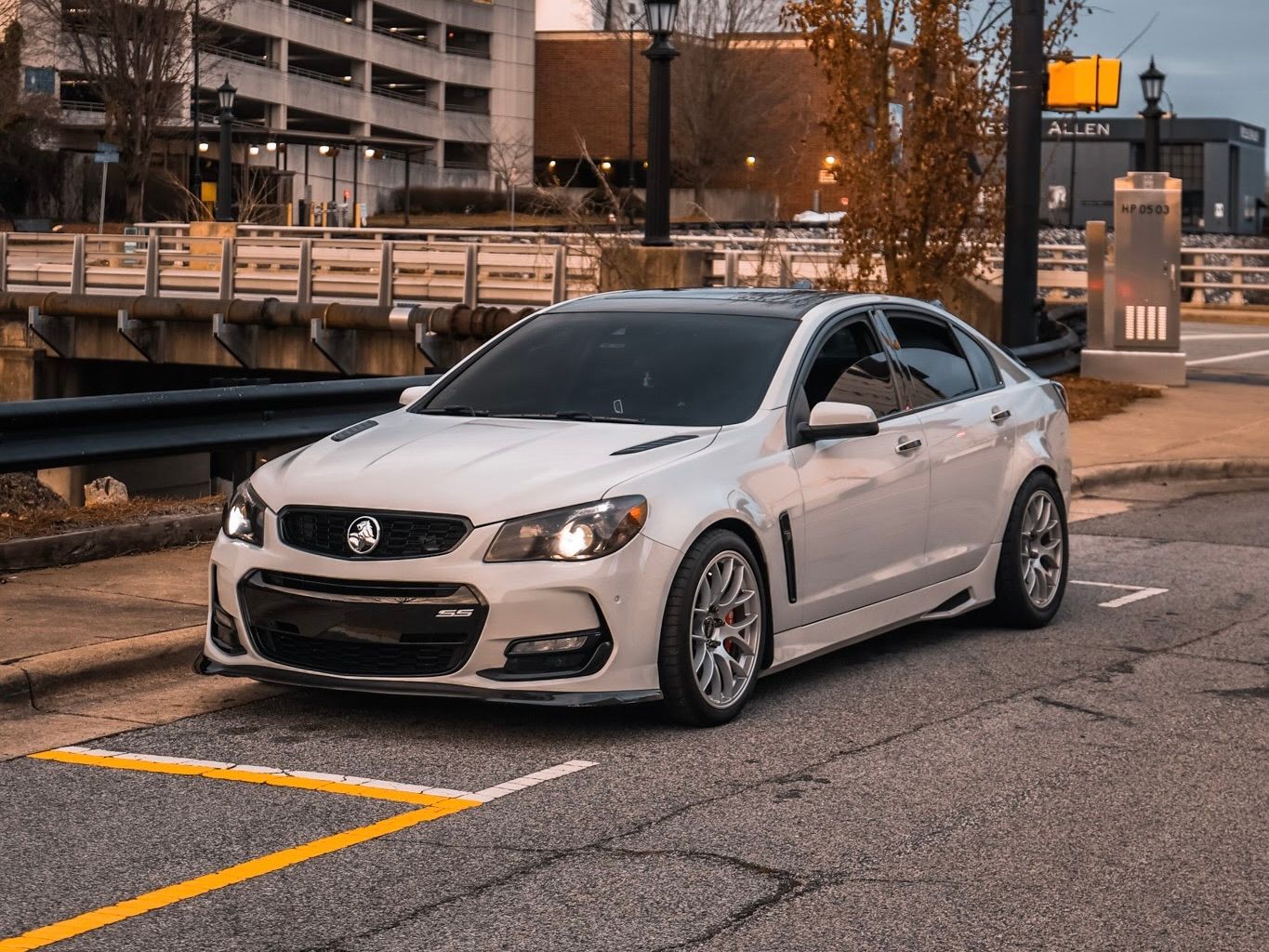 White Chevrolet SS with 19"/18" EC-7 Apex wheels in Race Silver