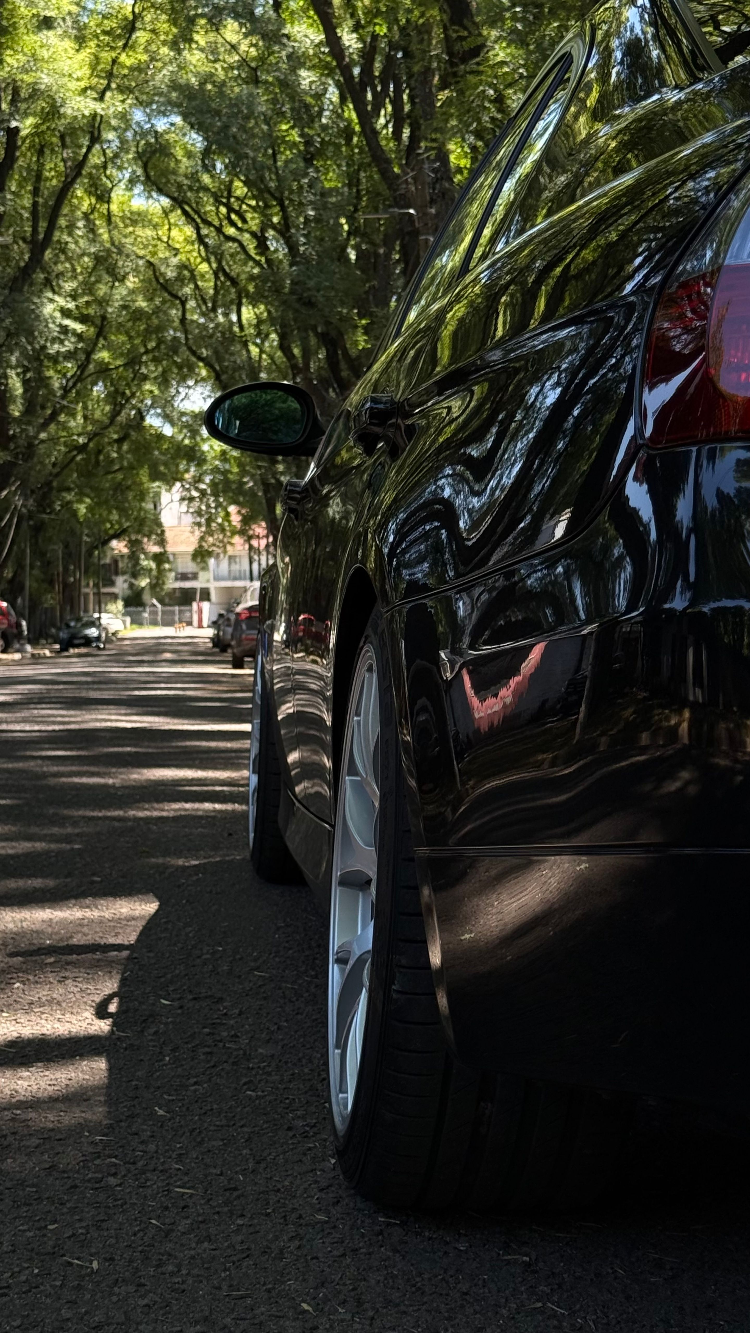 Black BMW E90 Sedan 3 Series with 18" EC-7 Apex wheels in Race Silver