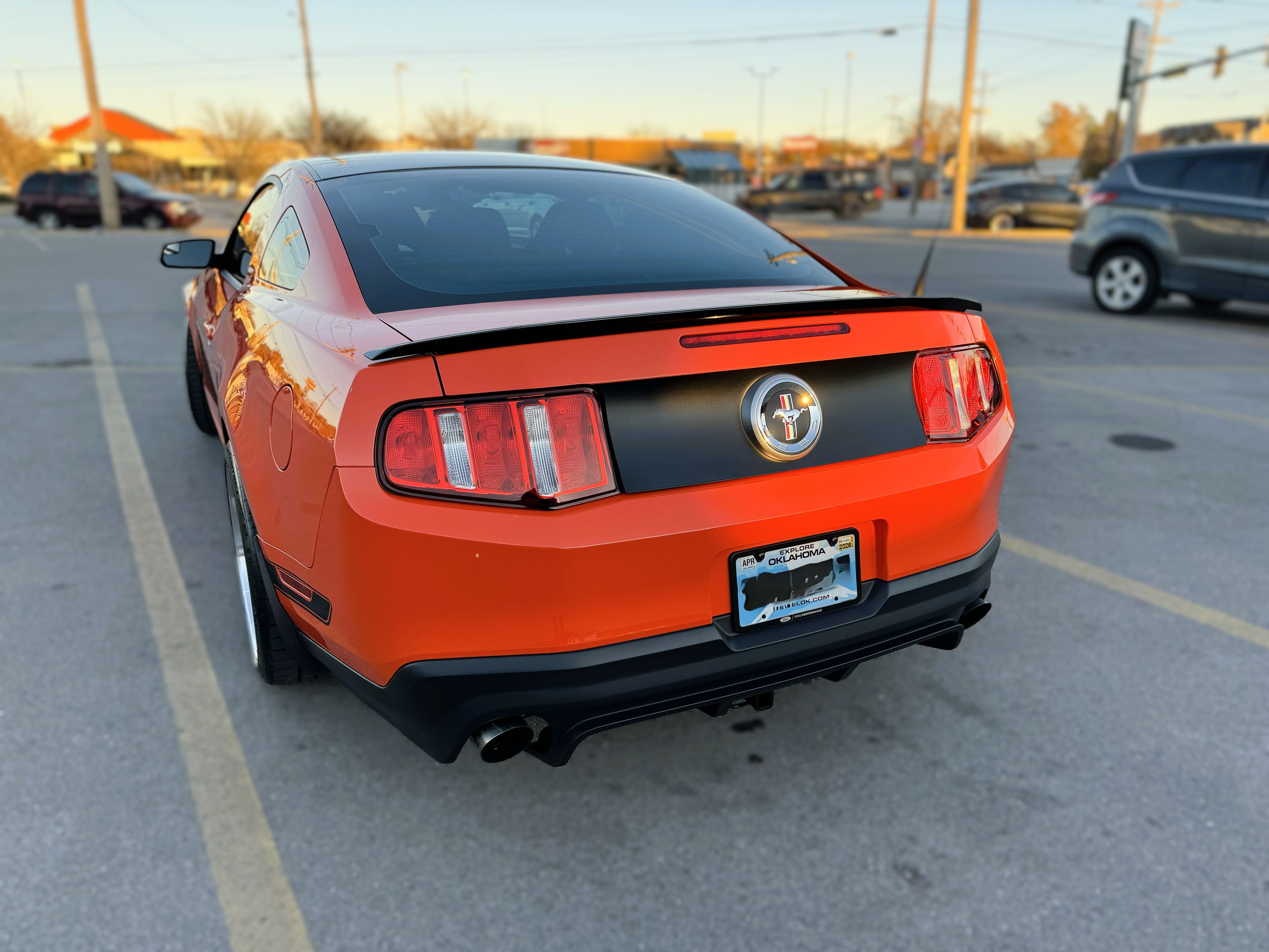 Orange Ford S197 Mustang Boss 302 with 19" ML-10RT Apex wheels in Machined Lip Anthracite