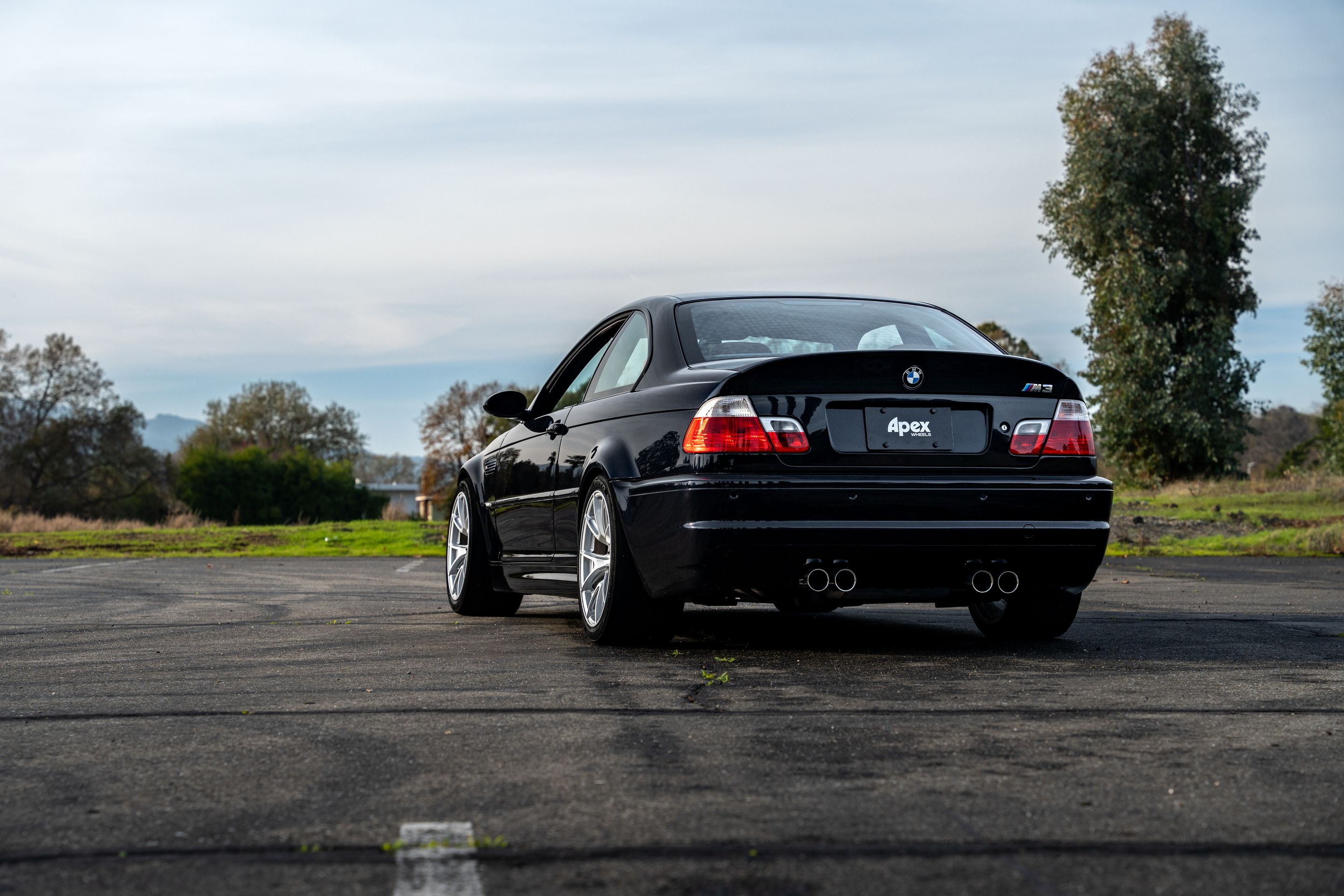Black BMW E46 M3 with 18" VS-5 Apex wheels in Race Silver