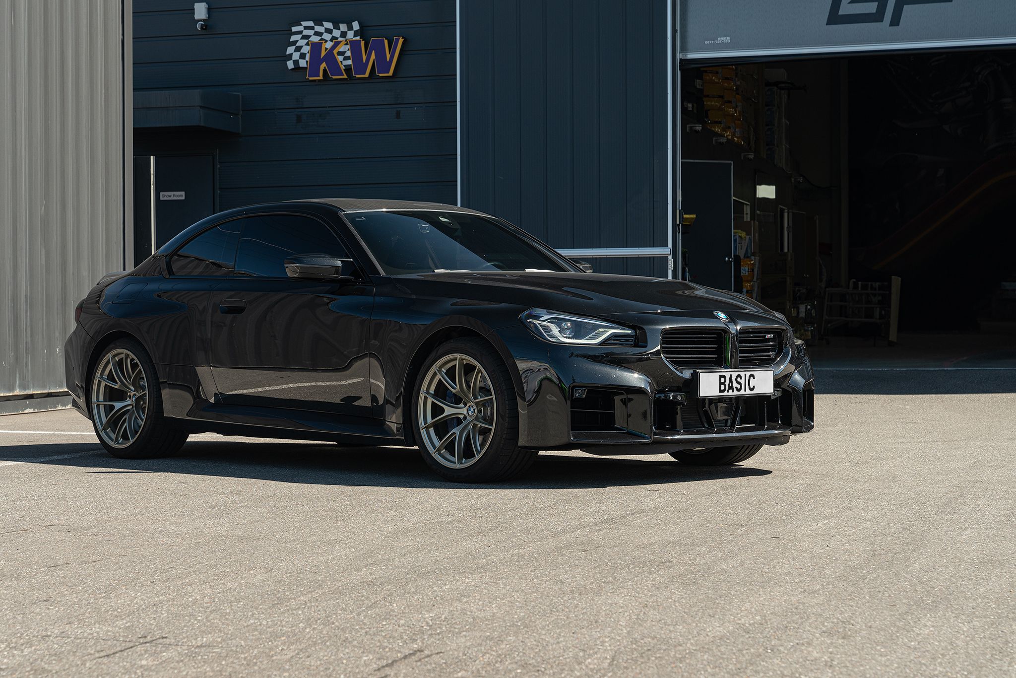 Black BMW G87 M2 with 19"/20" VS-5RS Apex wheels in Motorsport Gold