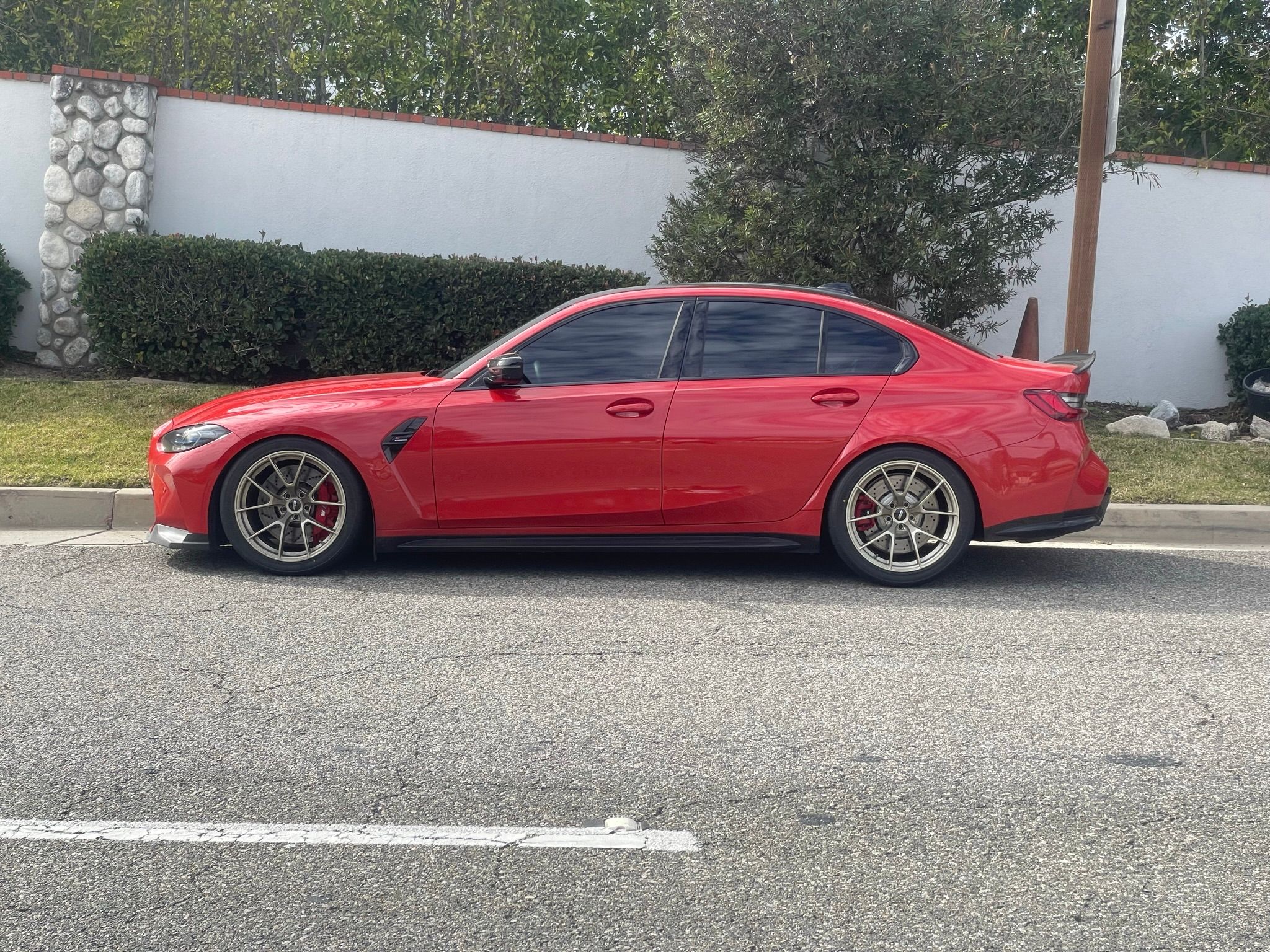 Red BMW G80 M3 with 19" VS-5RS Apex wheels in Motorsport Gold
