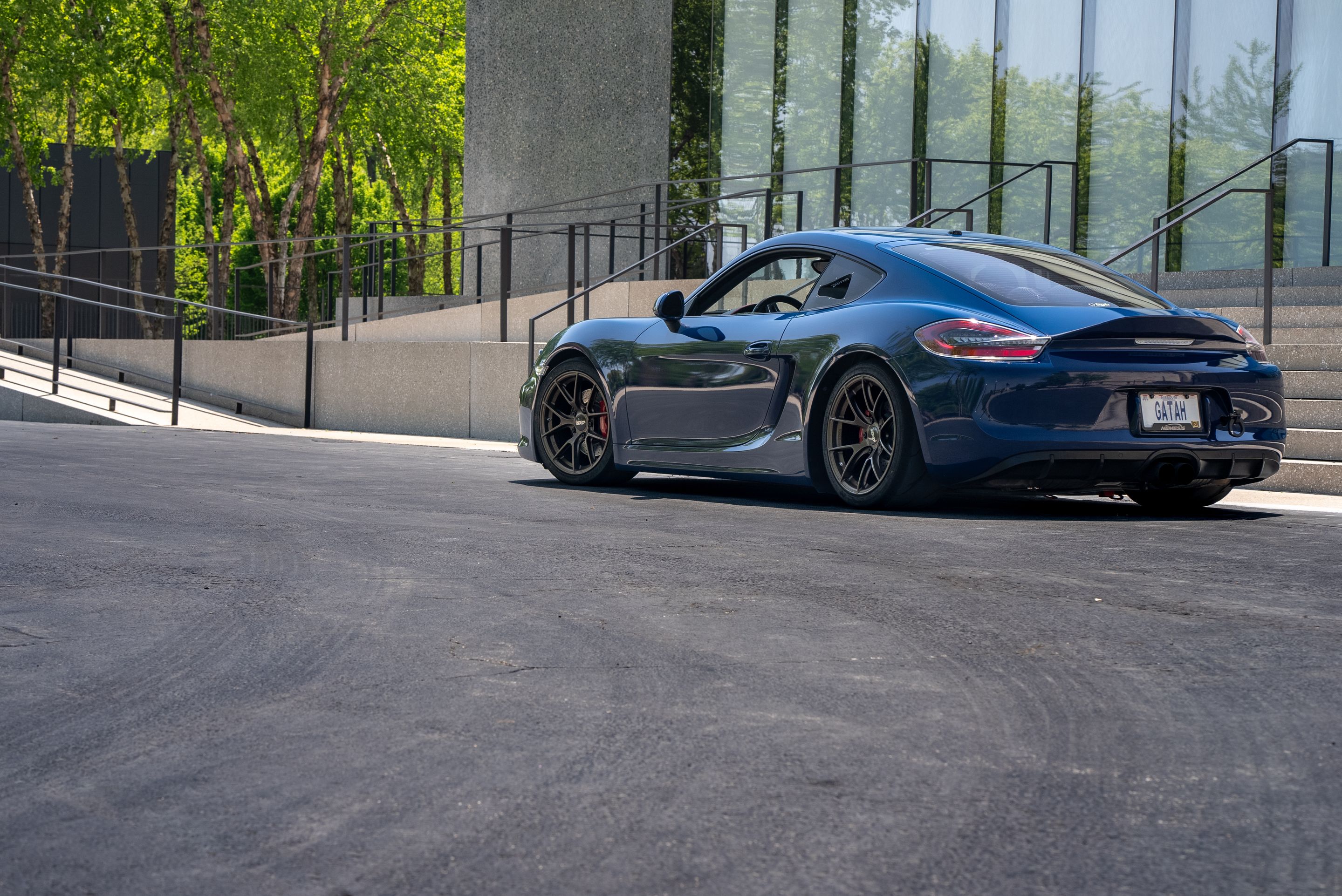 Blue Porsche 981 Cayman GTS with 18" VS-5RS Apex wheels in Satin Bronze