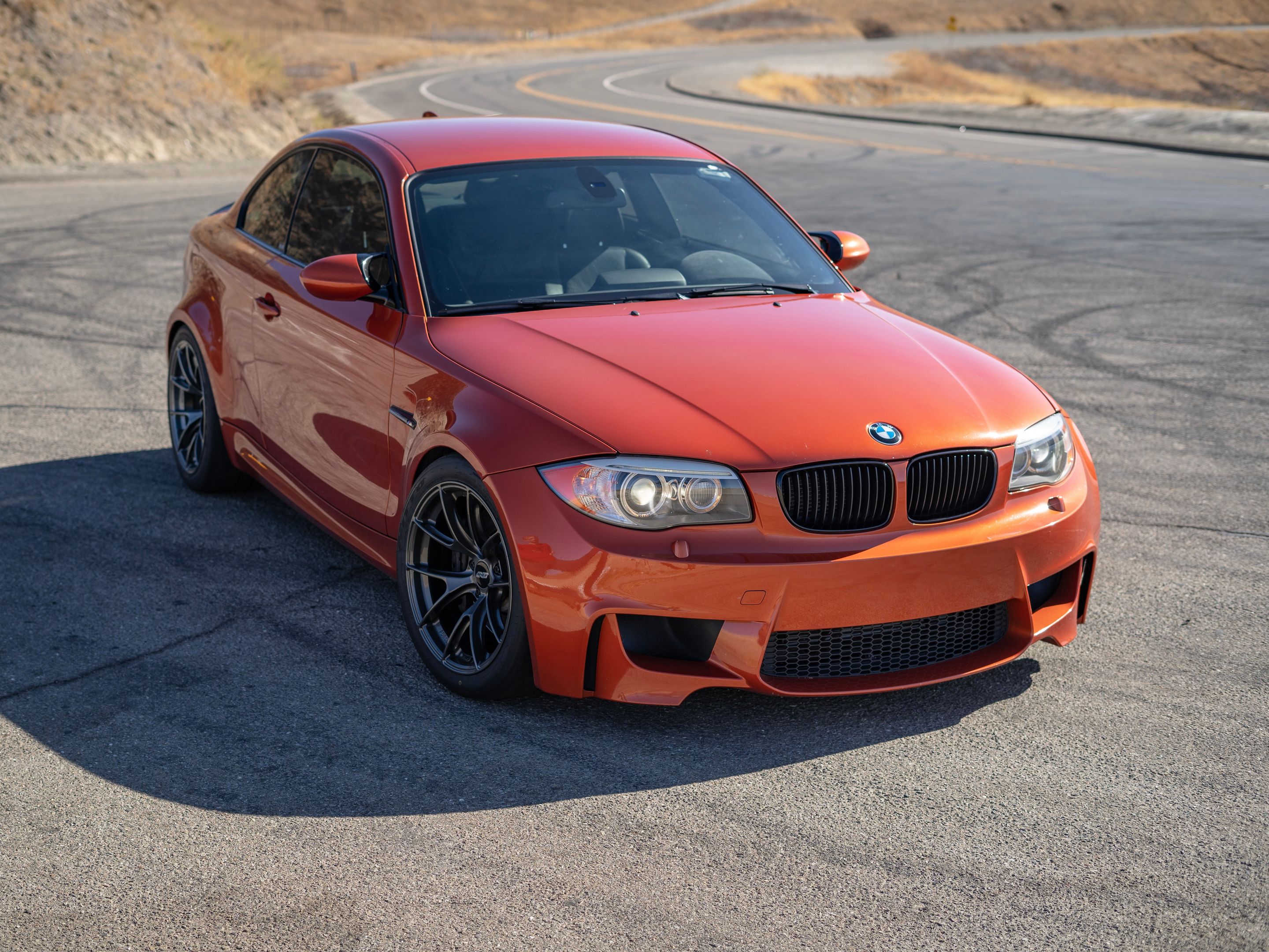 Orange BMW E82 1M with 18" VS-5RS Apex wheels in Anthracite
