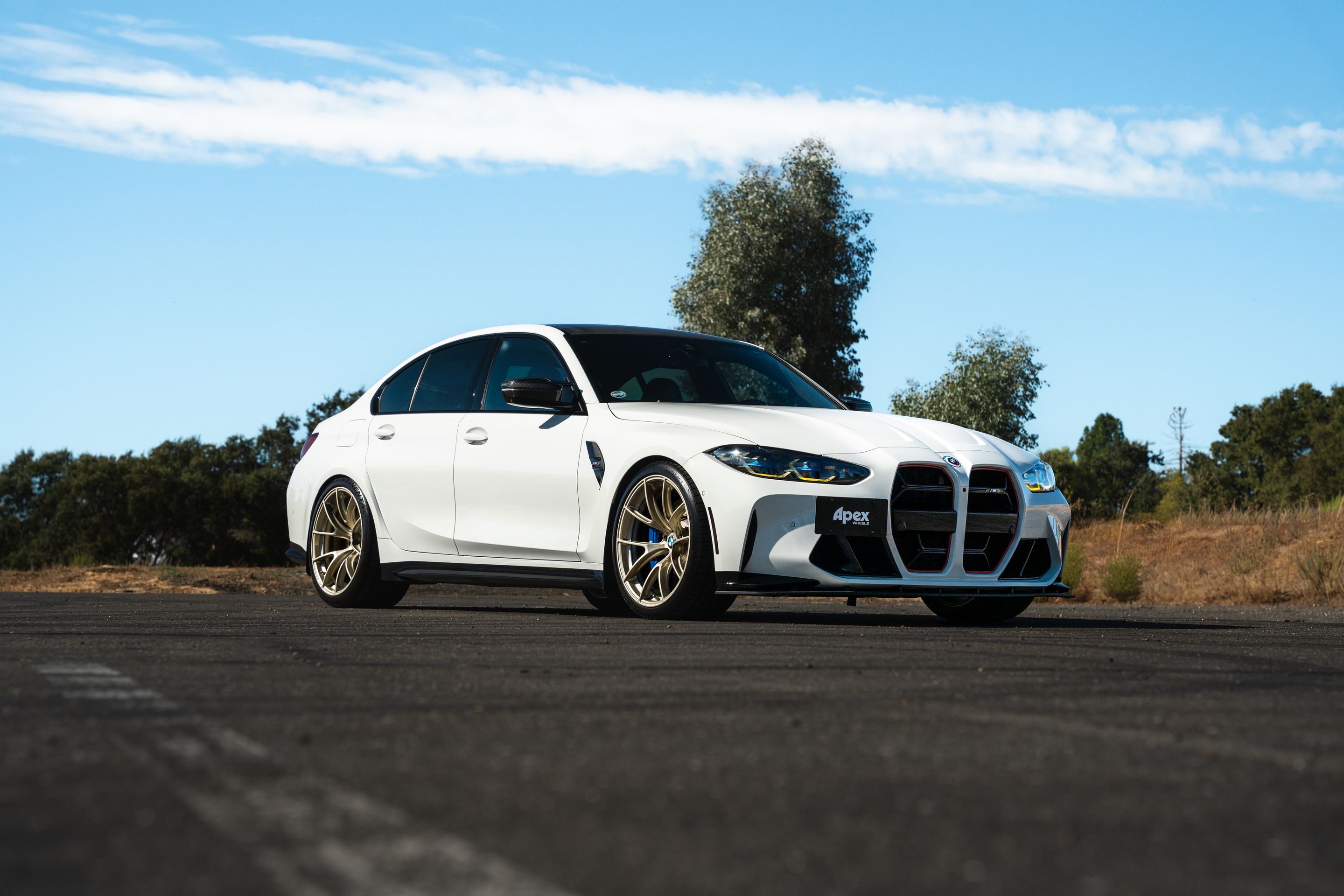 White BMW G80 M3 with 20" VS-5RS Apex wheels in Motorsport Gold