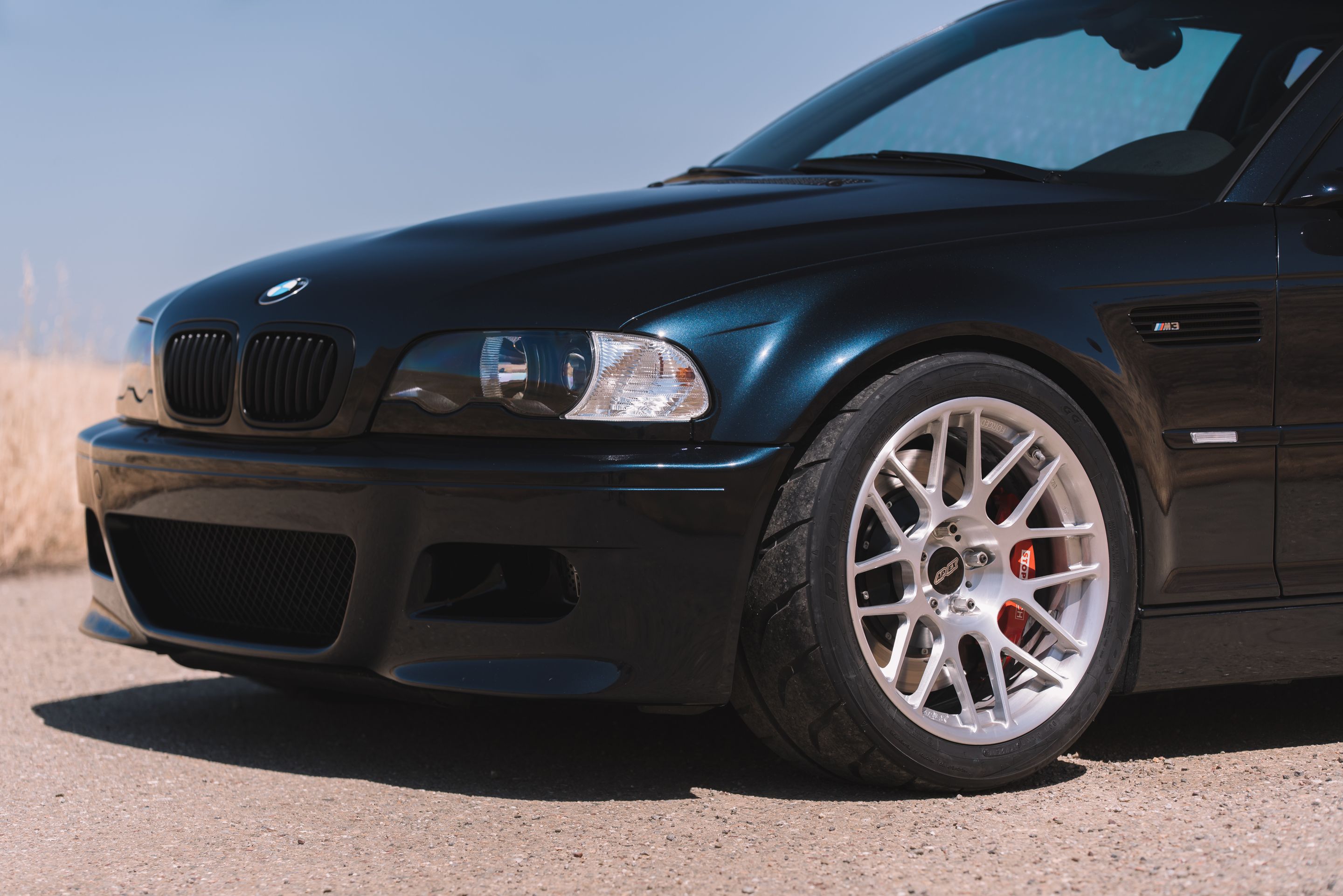 Black BMW E46 M3 with 18" ARC-8R Apex wheels in Brushed Clear
