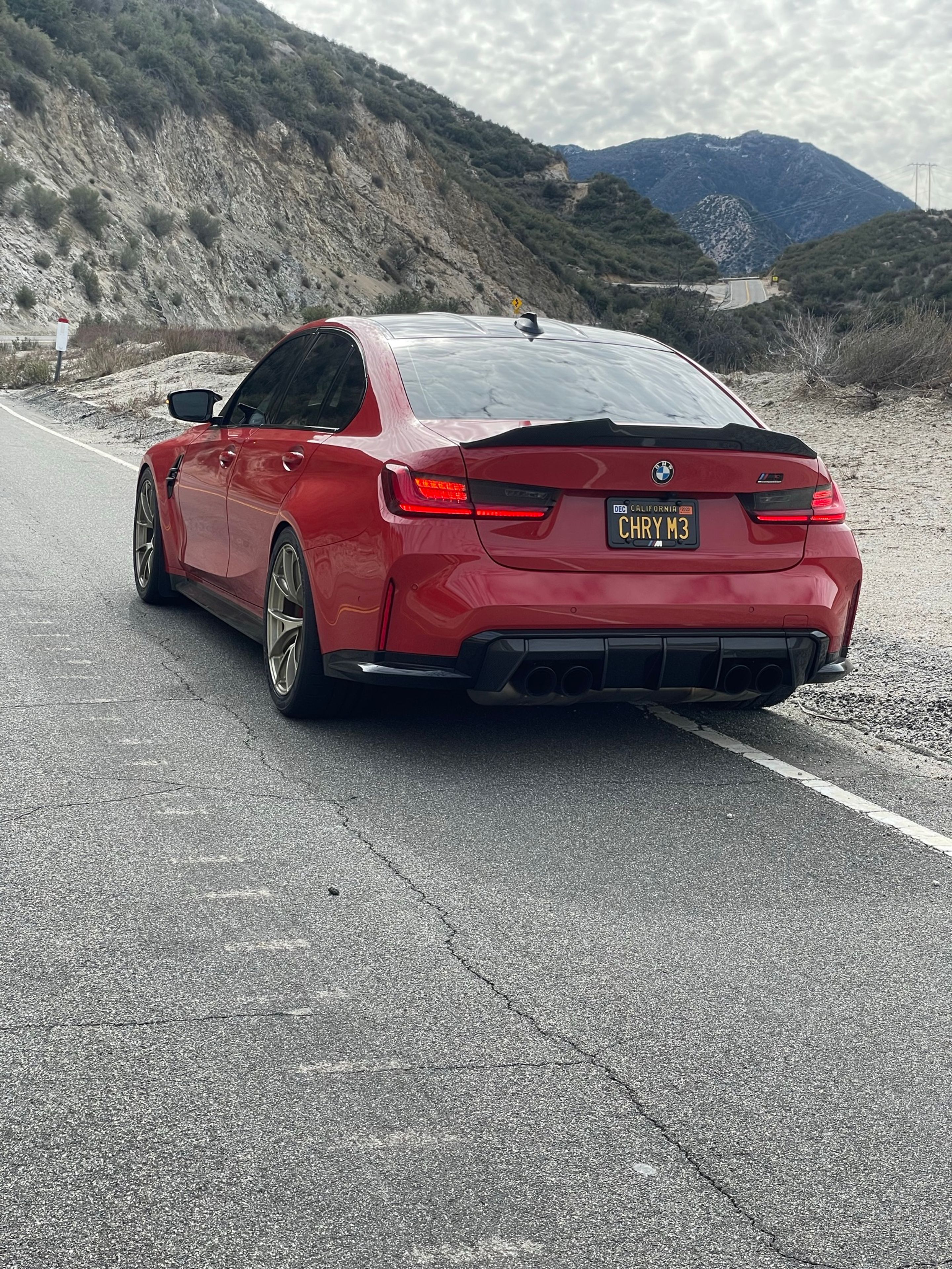 Red BMW G80 M3 with 19" VS-5RS Apex wheels in Motorsport Gold